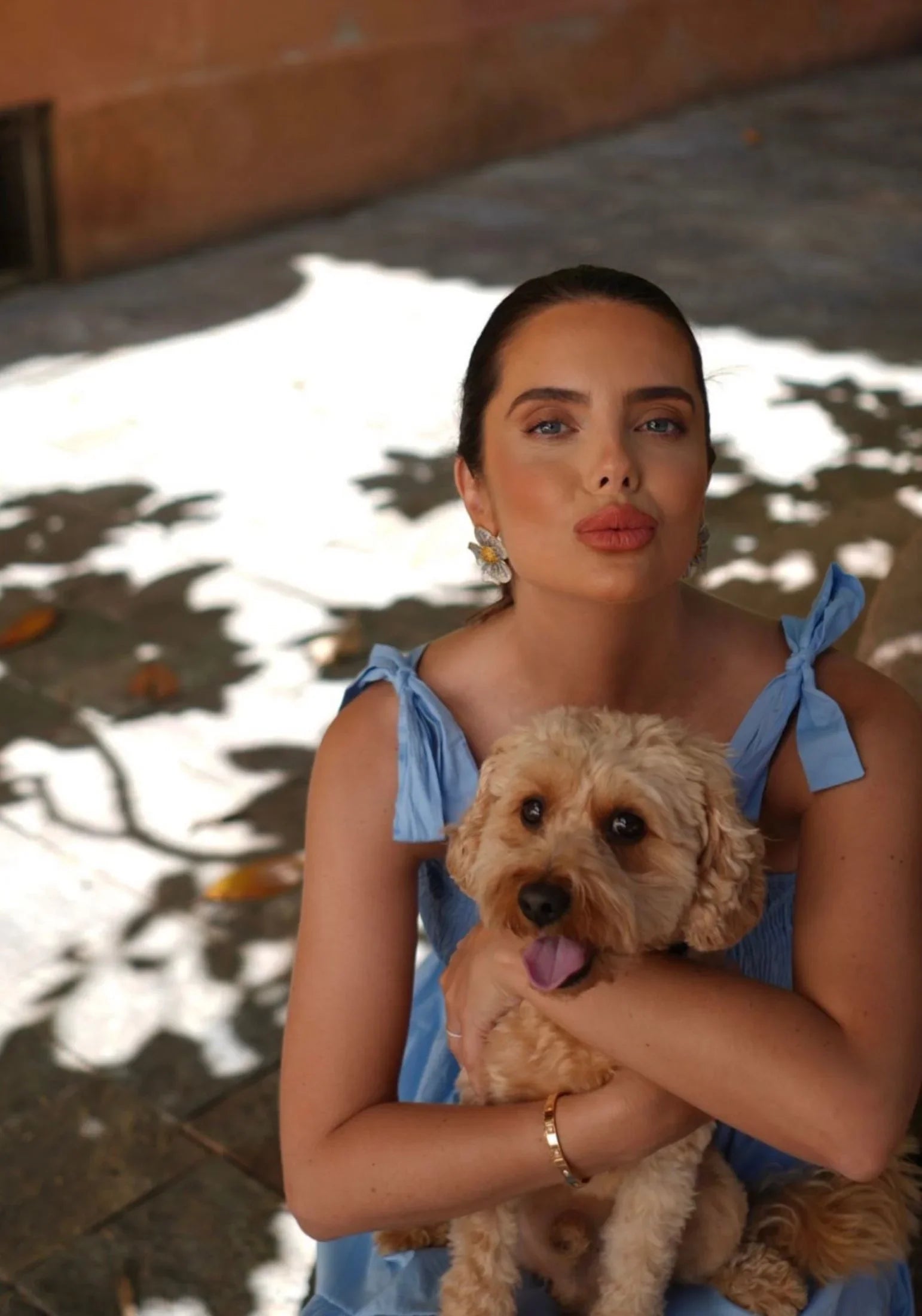 The earring worn by a model.