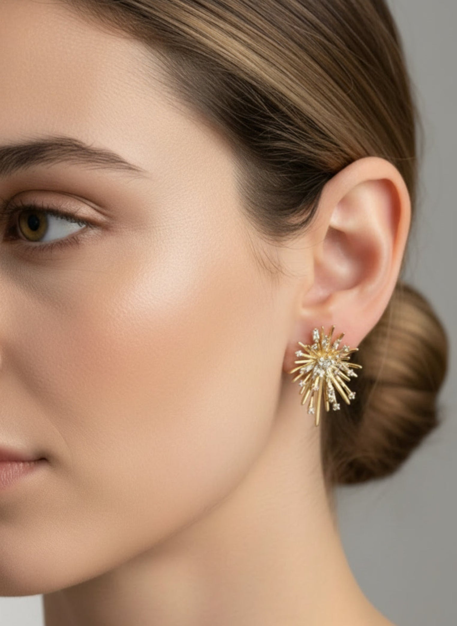 The earring worn by a model.