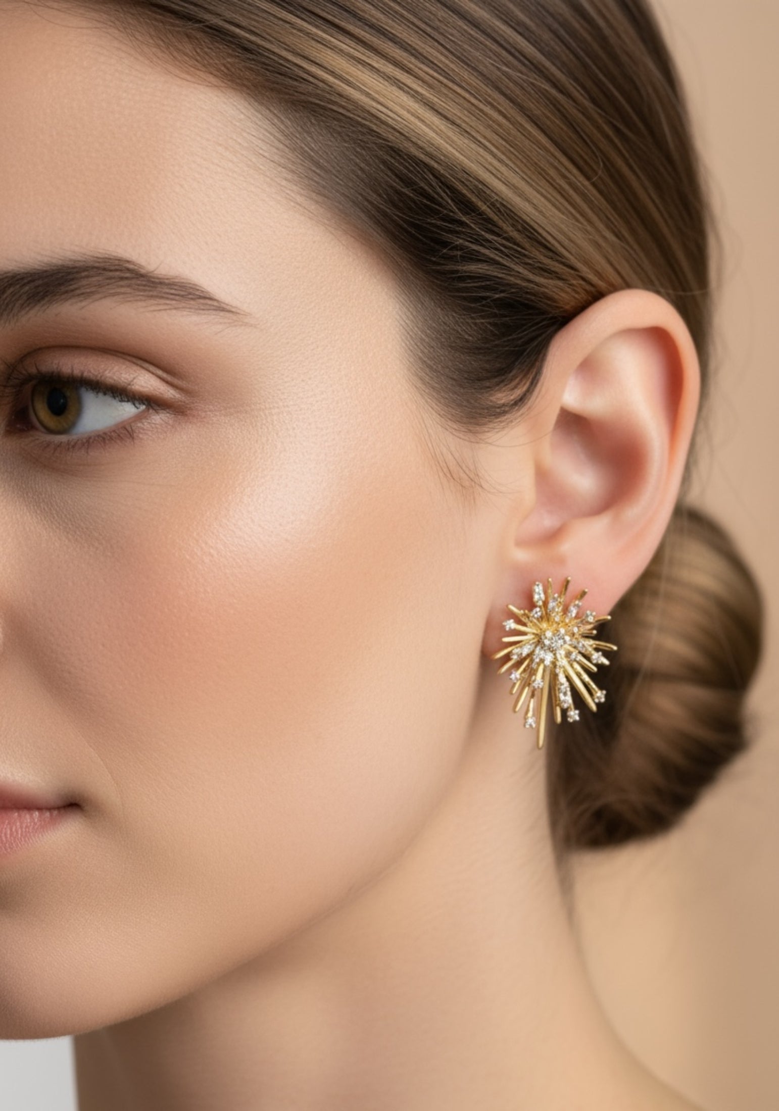 The earring worn by a model.