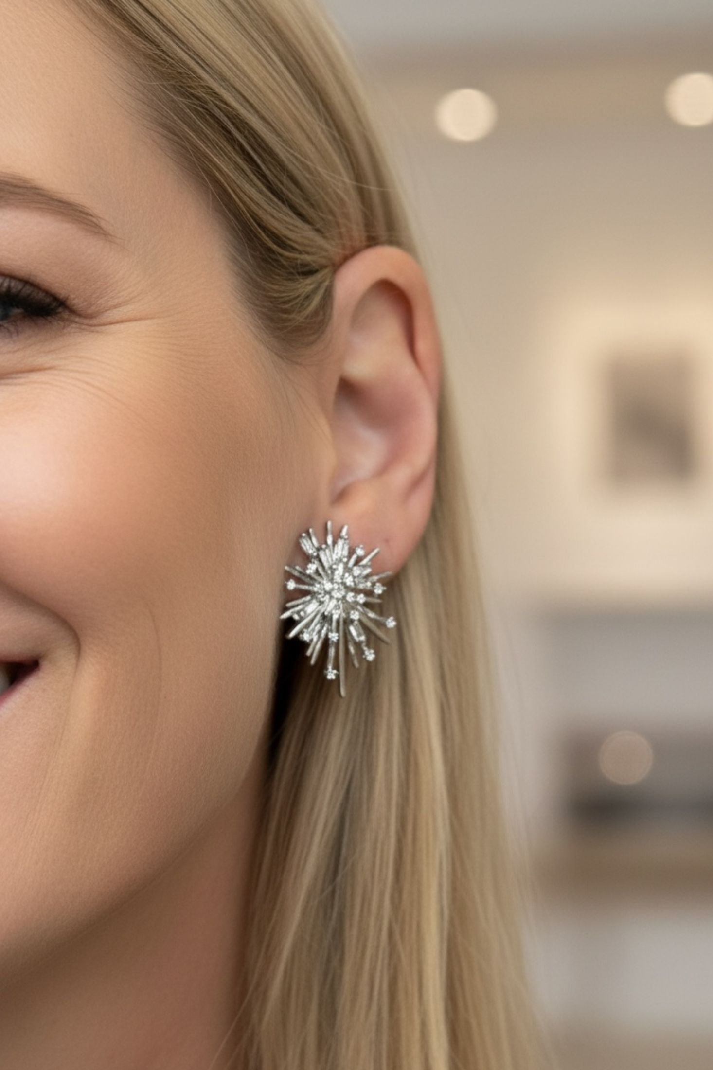 The earring worn by a model.