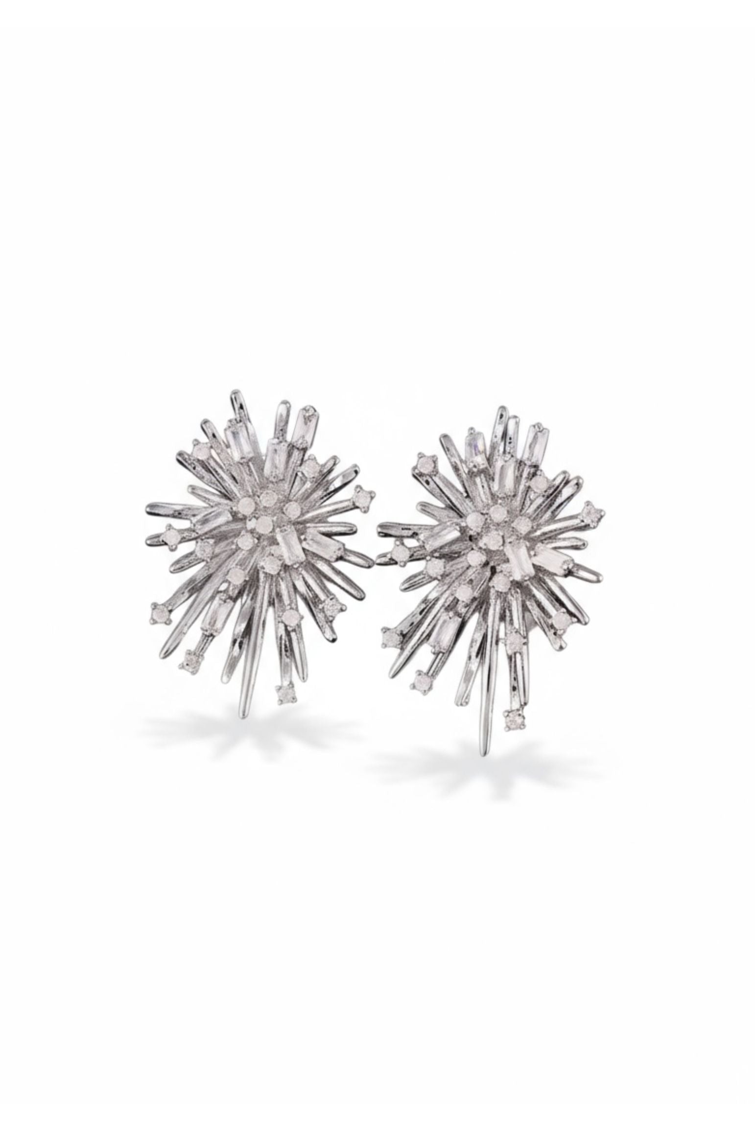 Silver starburst stud earrings.
