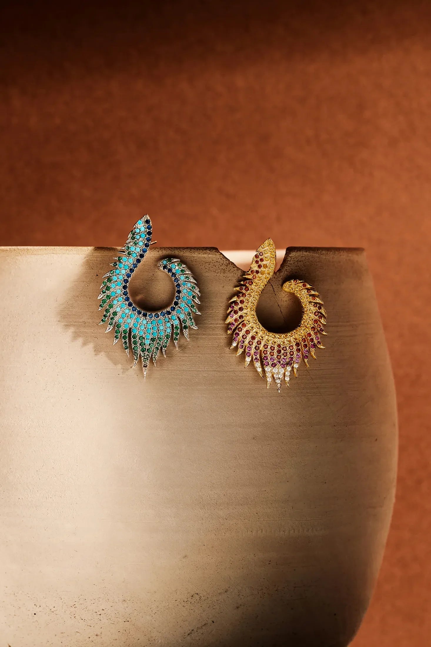 Flame Earrings Cold Ice Silver worn by a model, showing how they sit on the ear and their scale.