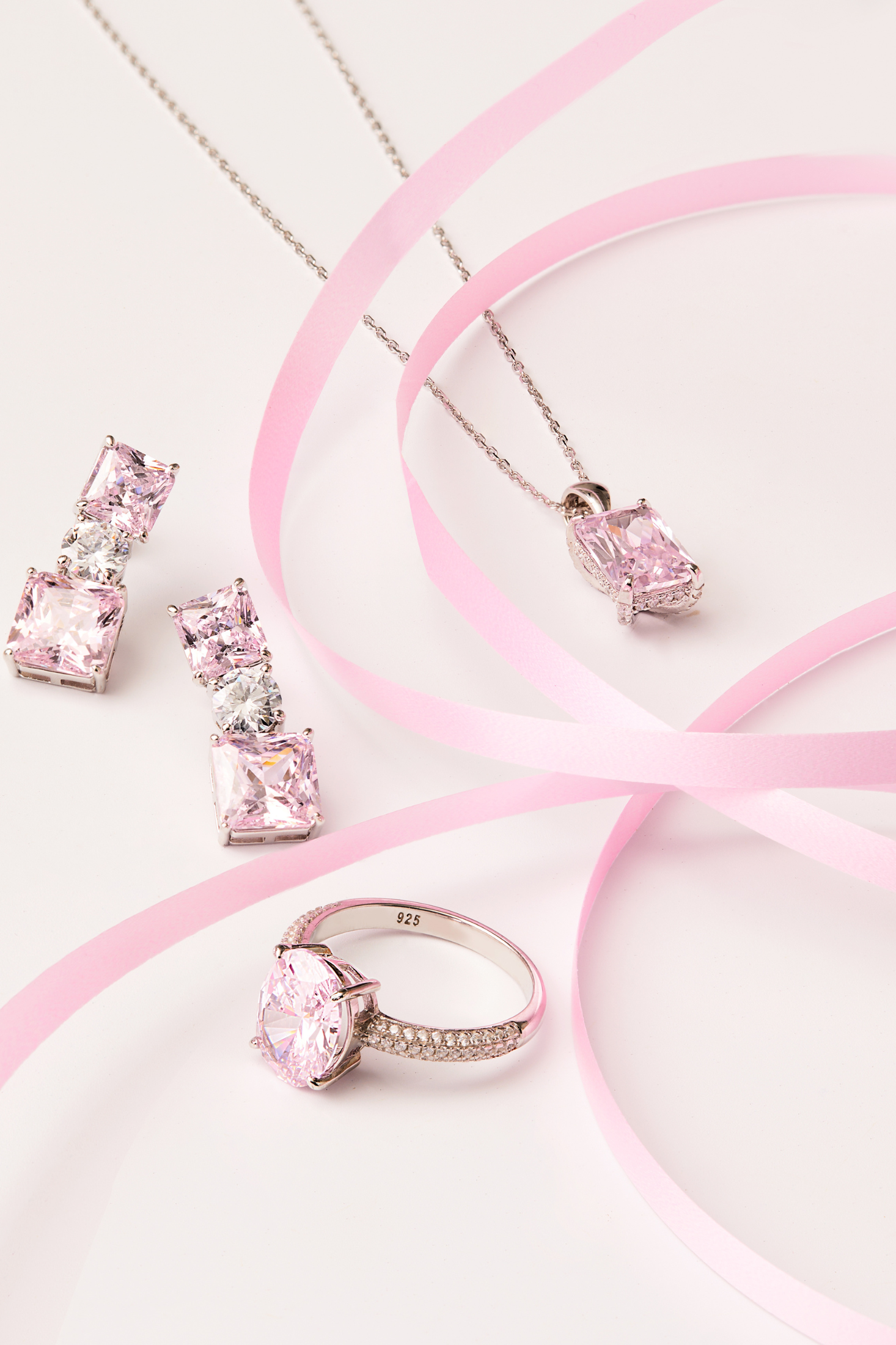 Penelope Drop Earrings Morganite Silver worn by a model, showing how they sit on the ear and their scale.