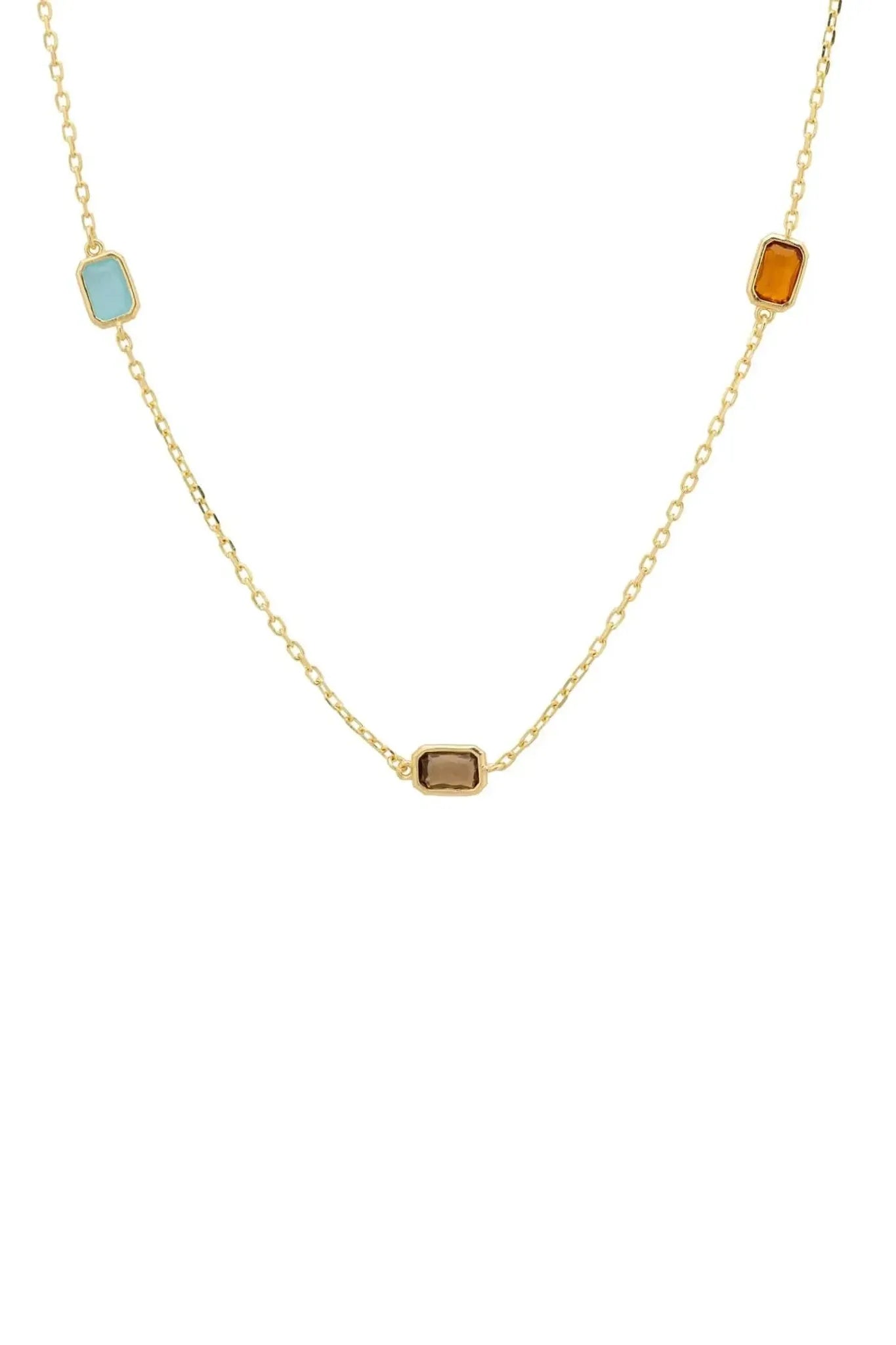 Gold chain necklace with three rectangular gemstones in blue, amber, and brown tones, ethically sourced and hypoallergenic.