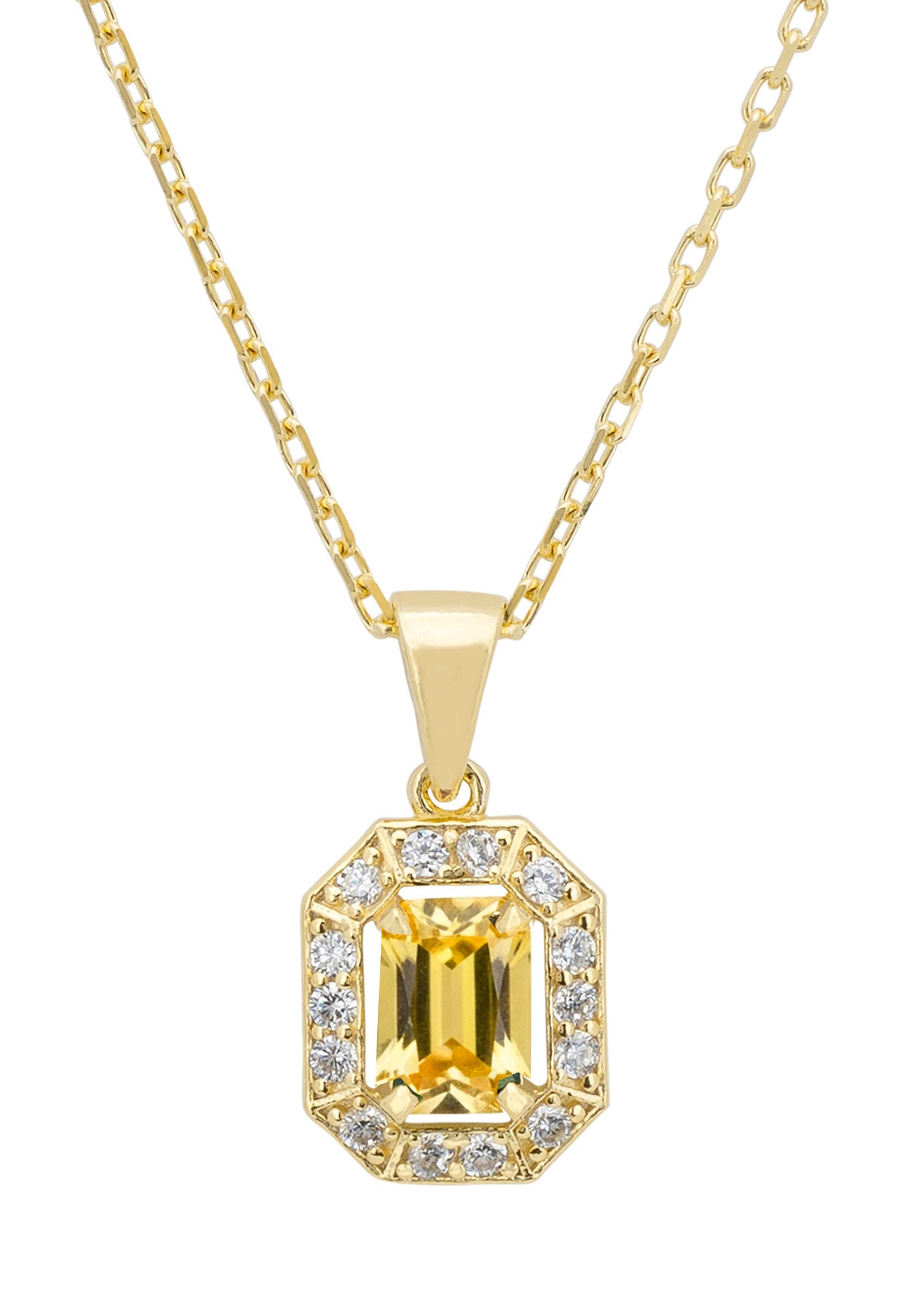 Gold necklace with a yellow gemstone pendant on a white background