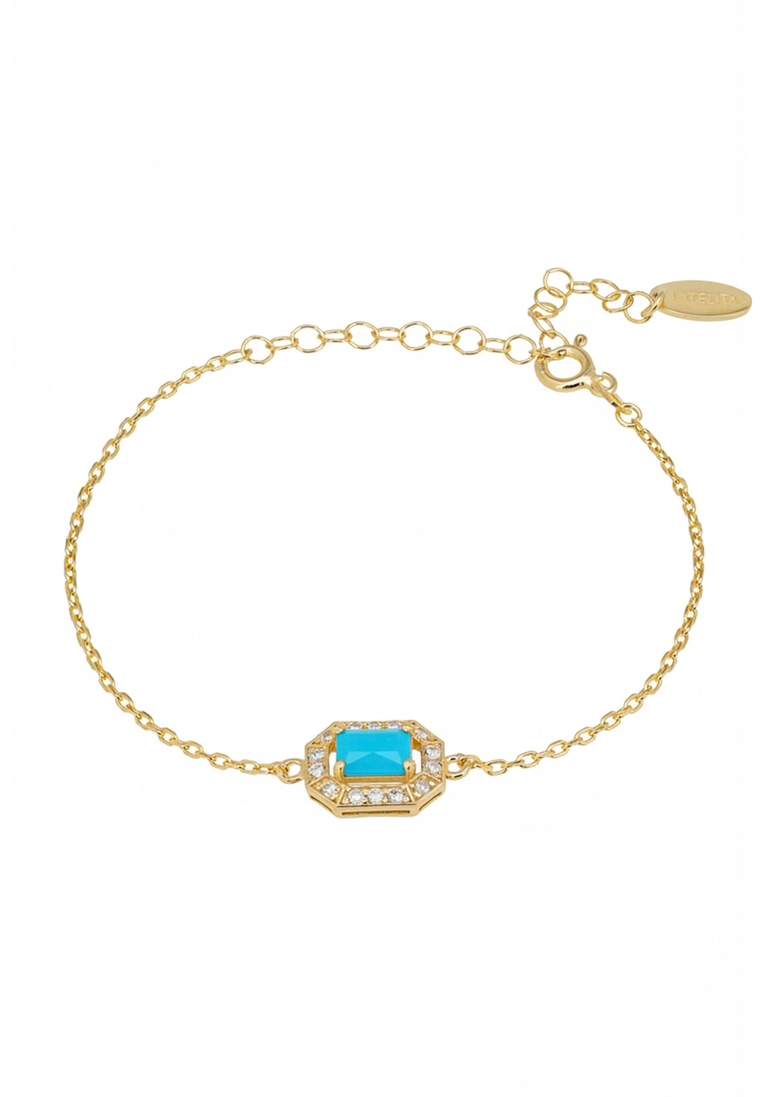 Gold bracelet with a turquoise stone on a white background