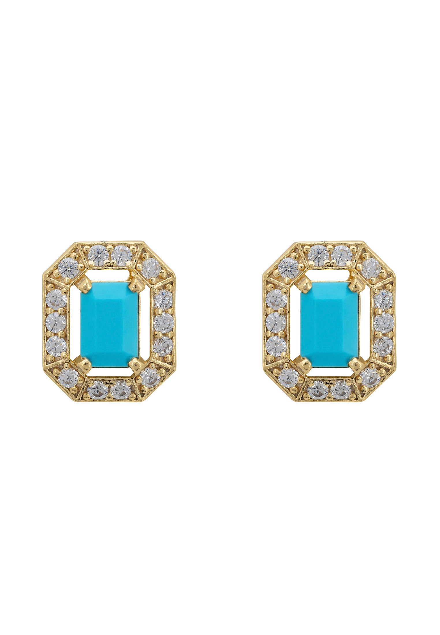 Pair of gold-framed earrings with turquoise centers on a white background