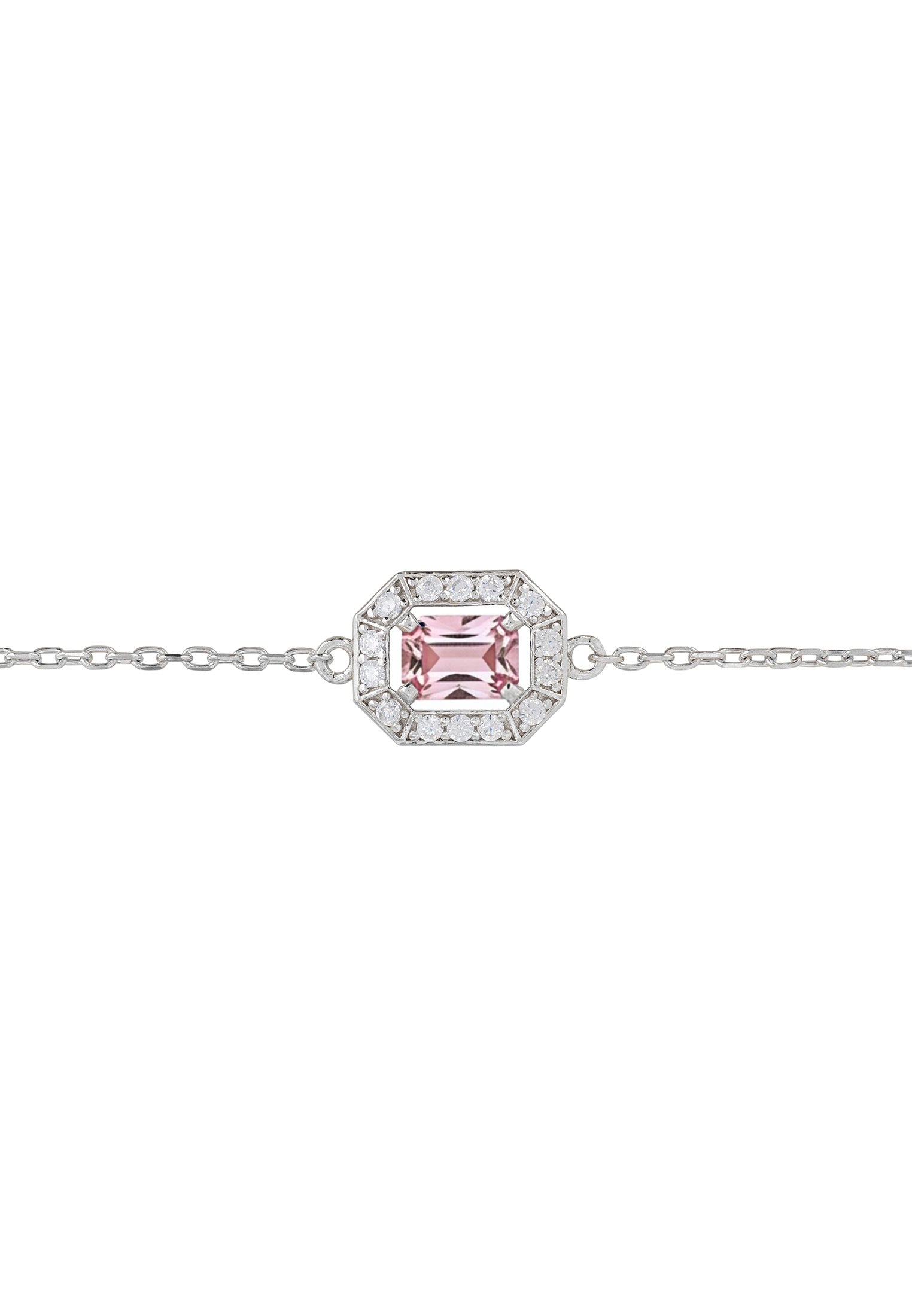Silver bracelet with a pink gemstone on a white background