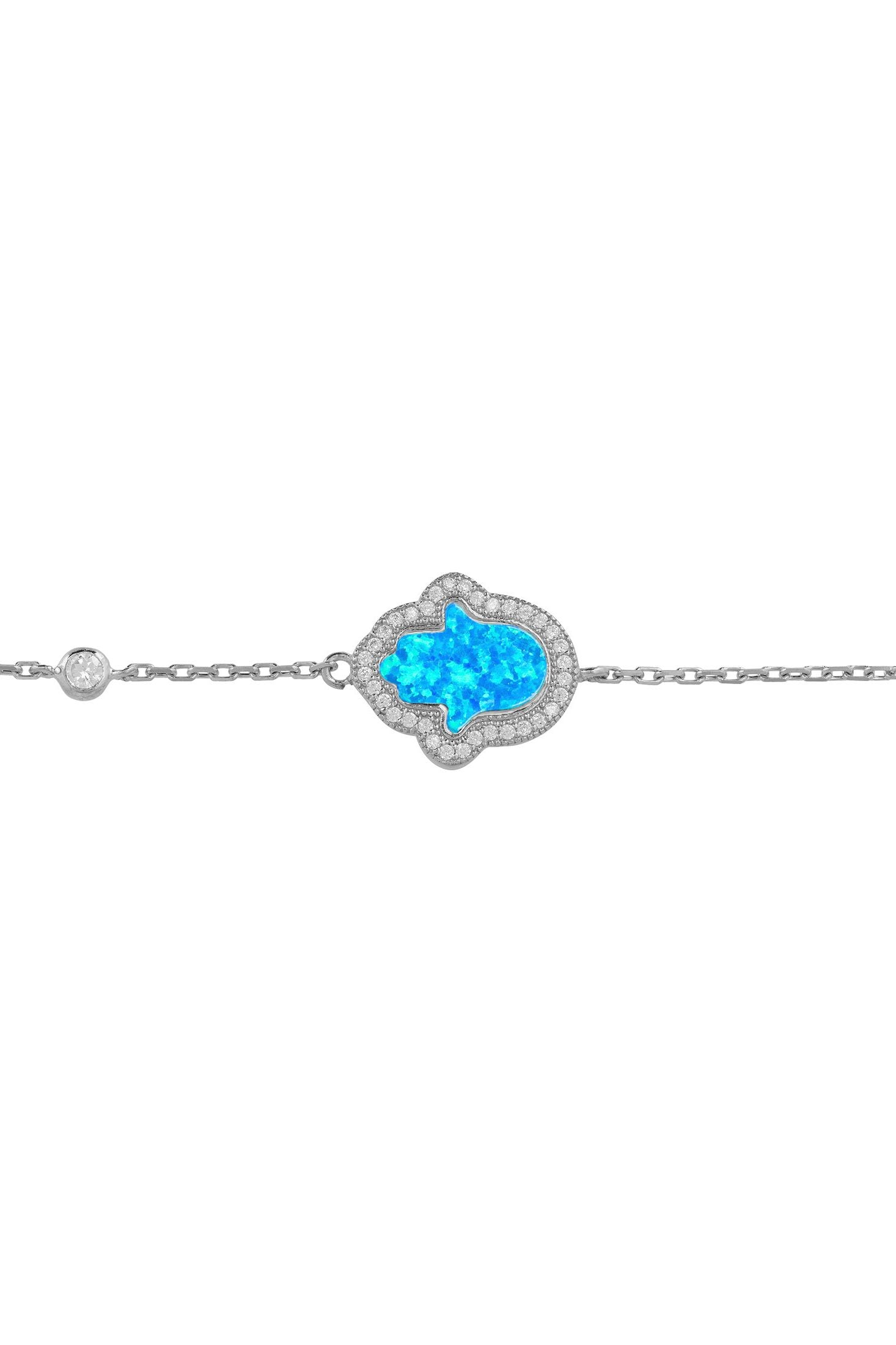 Delicate bracelet with a turquoise gemstone on a white background