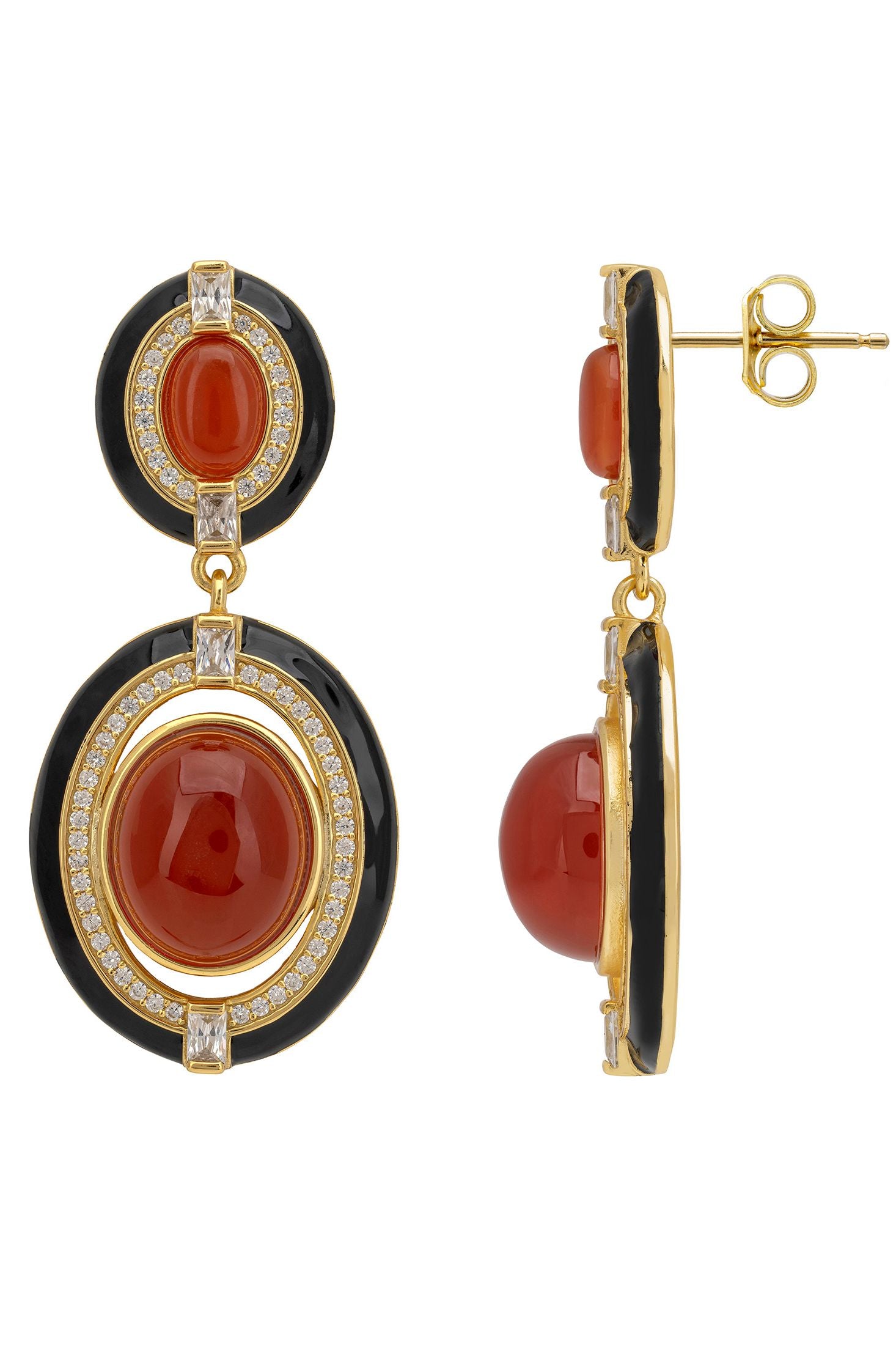 Pair of earrings with red stones and gold accents on a white background
