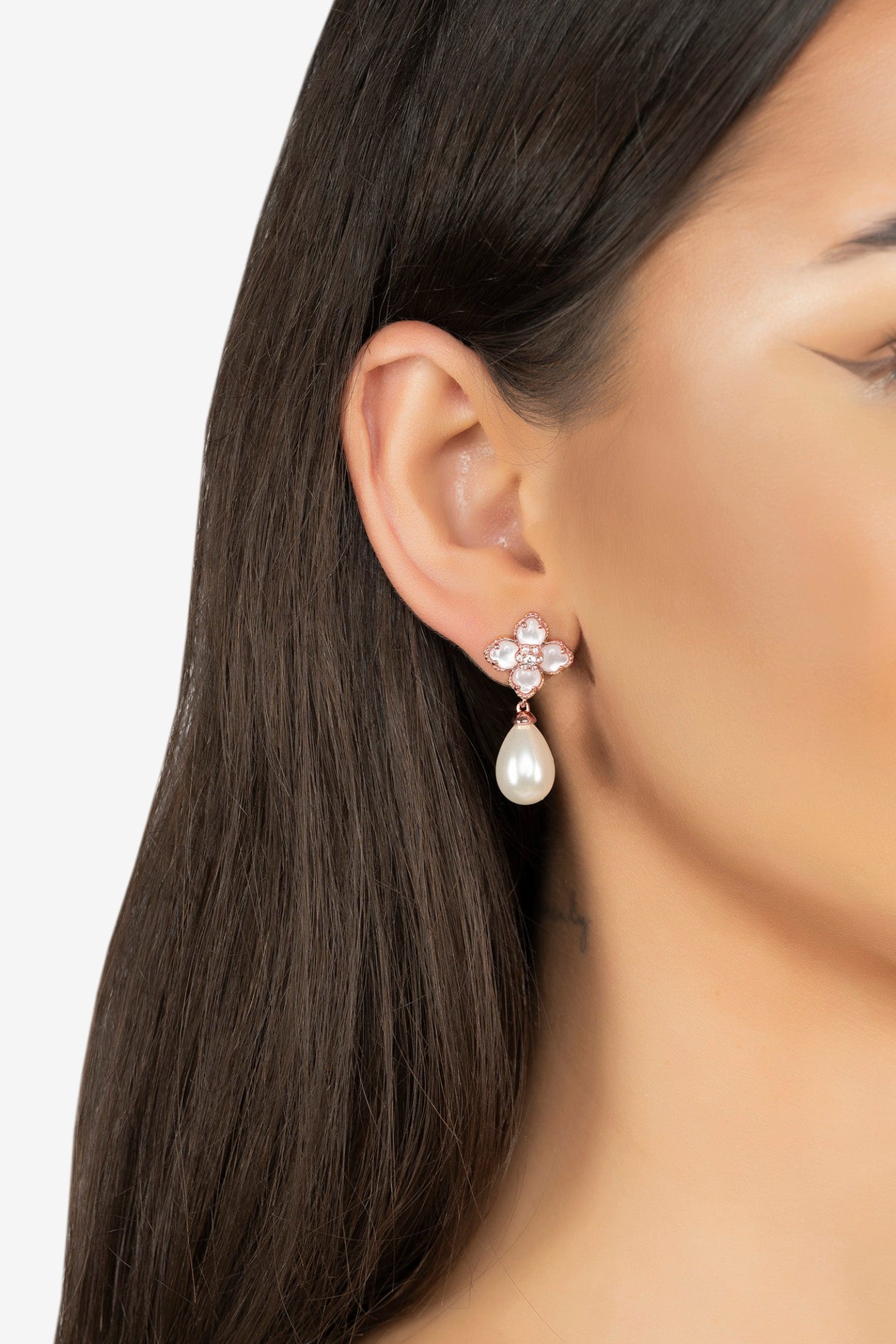The earring worn by a model.
