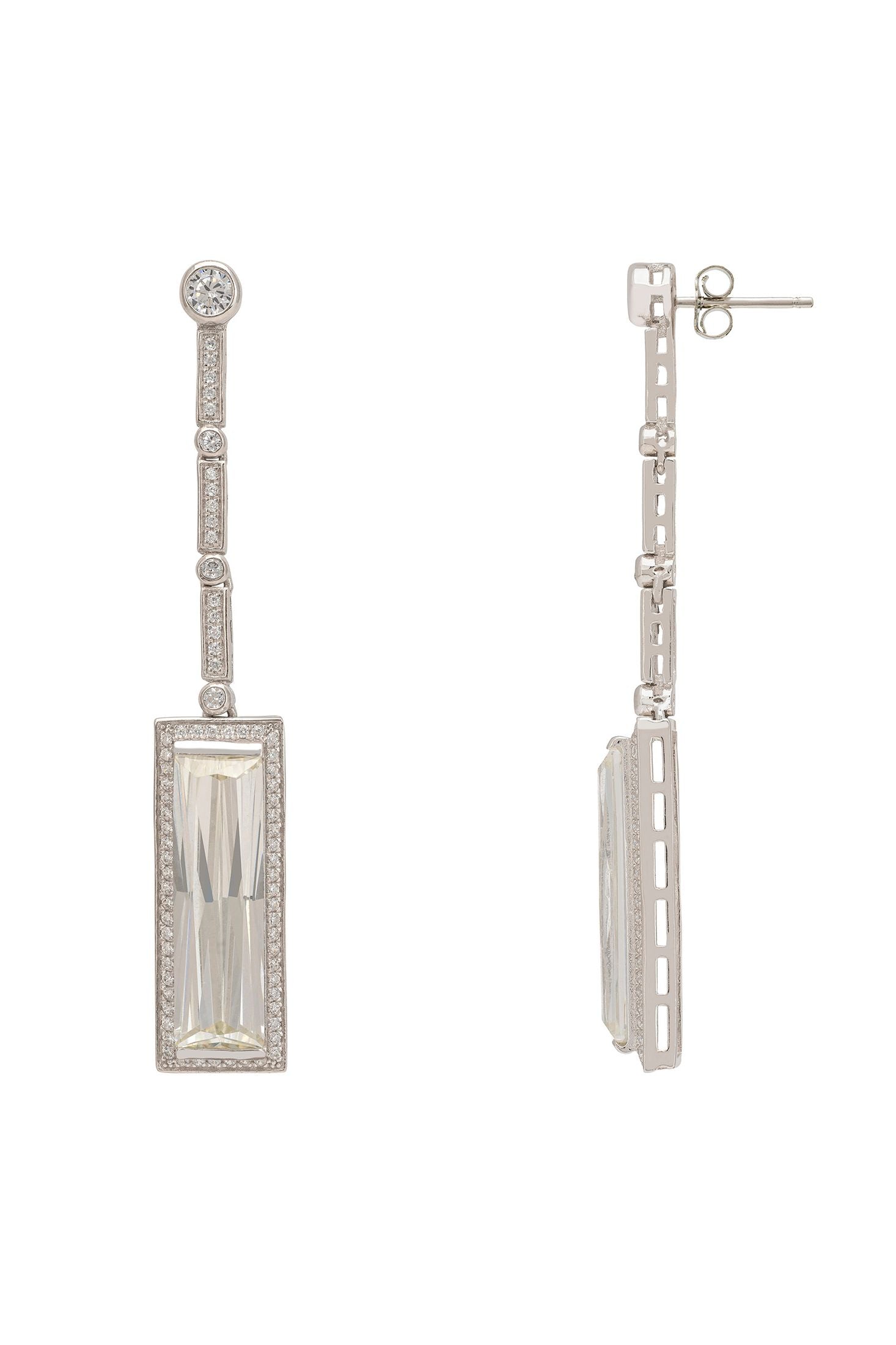 Pair of silver earrings with rectangular gemstones on a white background