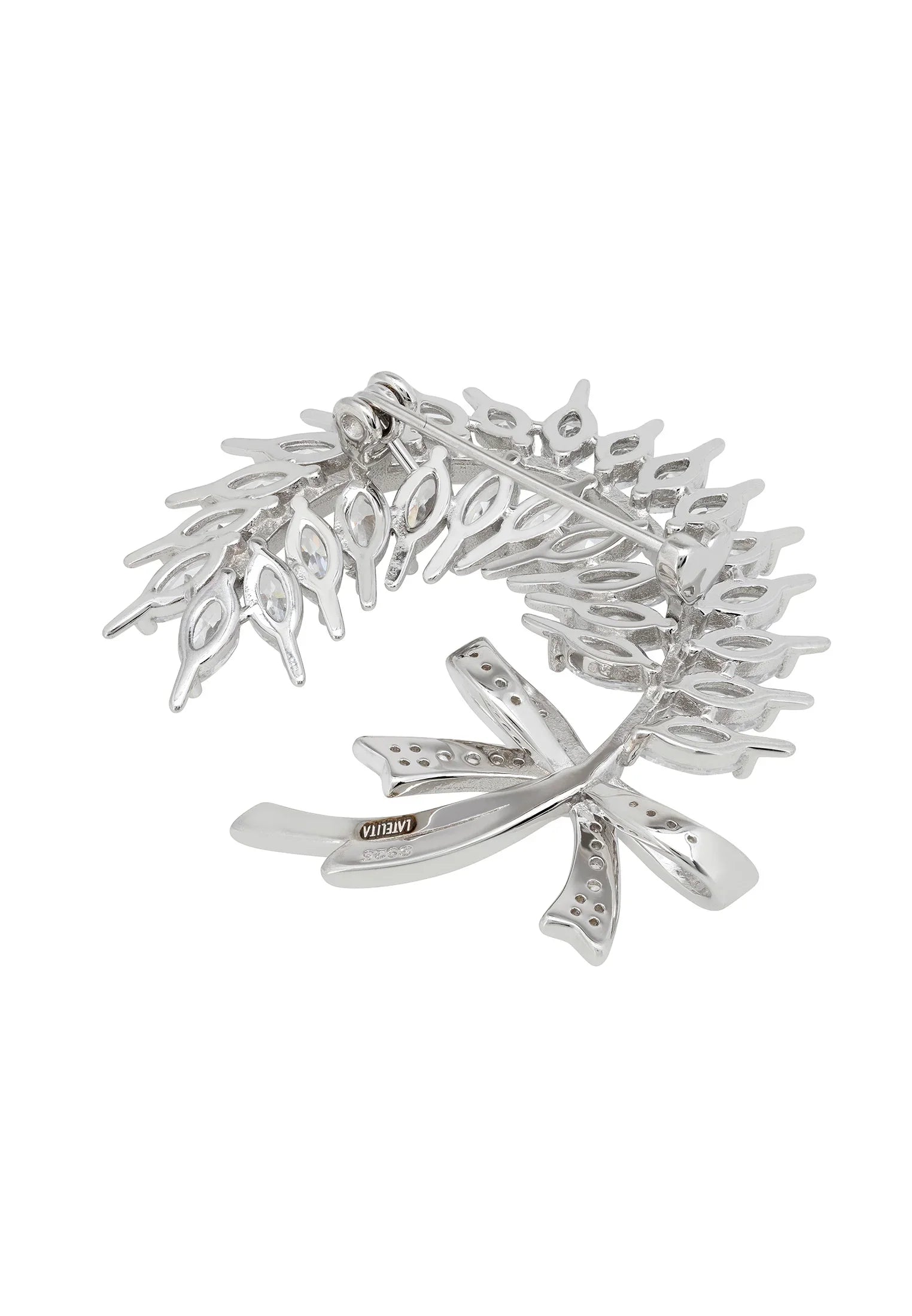 Silver pin back of the brooch.