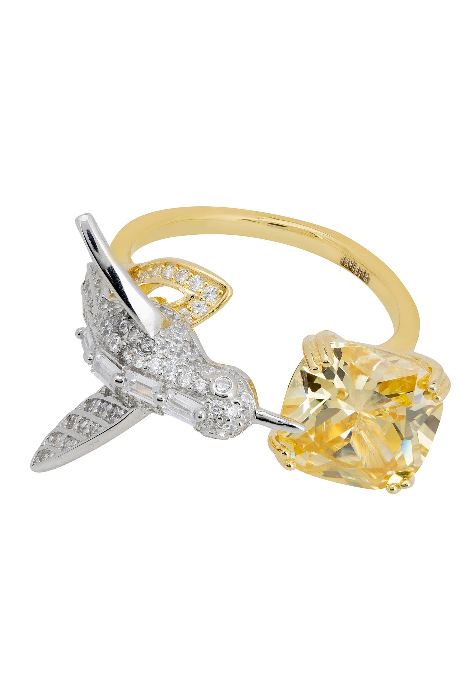 Silver hummingbird and yellow topaz gold ring.