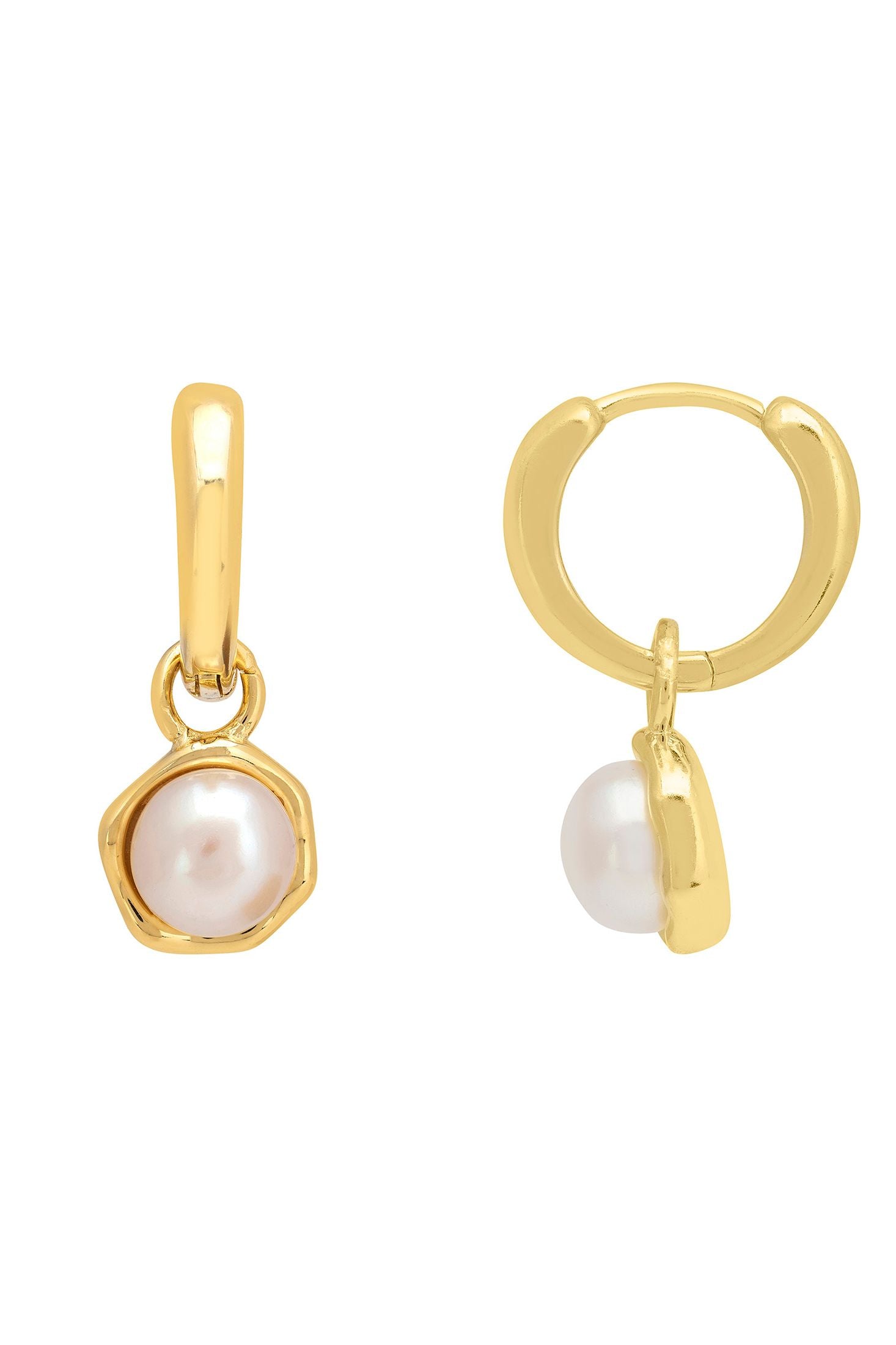Gold hoop earrings with pearl drops on a white background