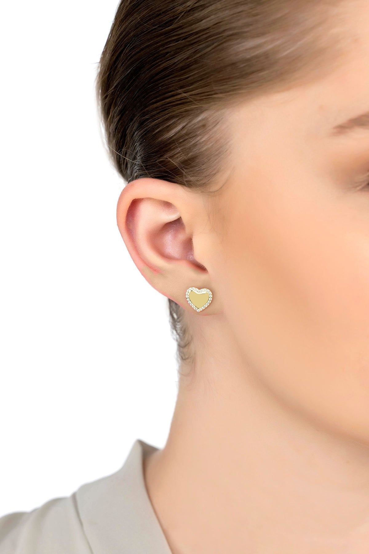 The earring worn by a model.