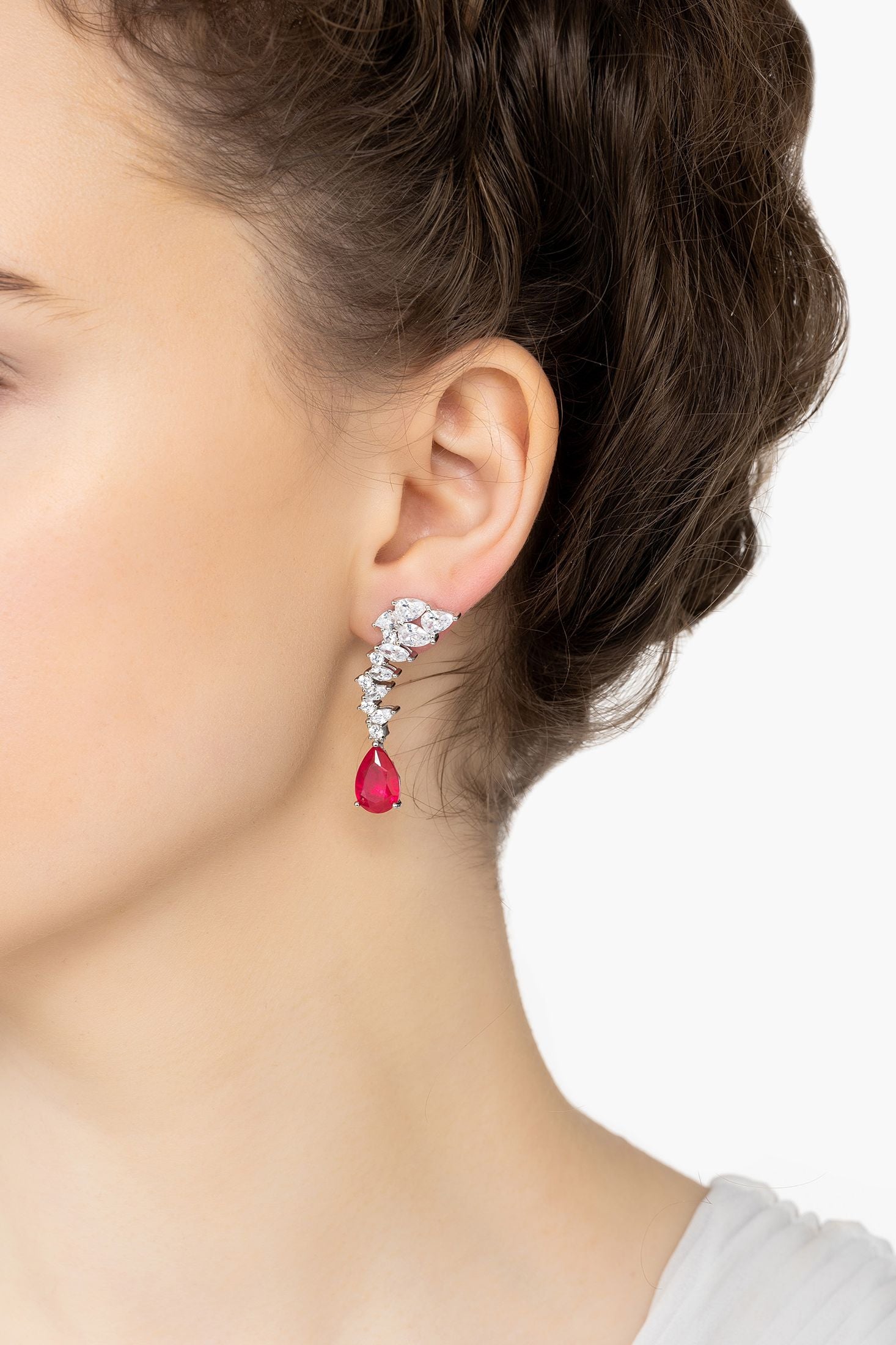 Angled view of Henriette Teardrop Earrings Pink Tourmaline Silver, showing silver finish and the jewellery profile.