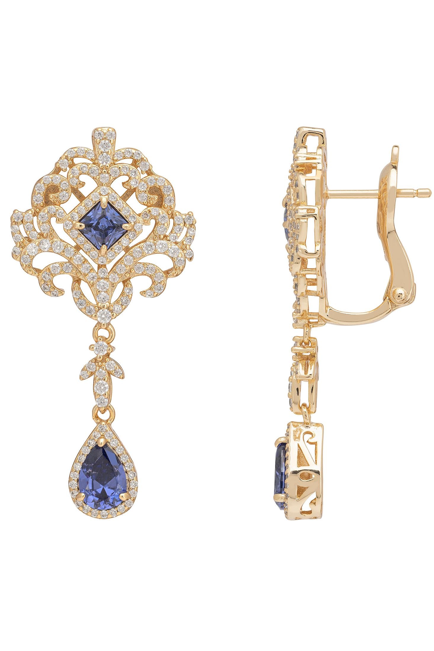 Gold earrings with blue gemstones on a white background