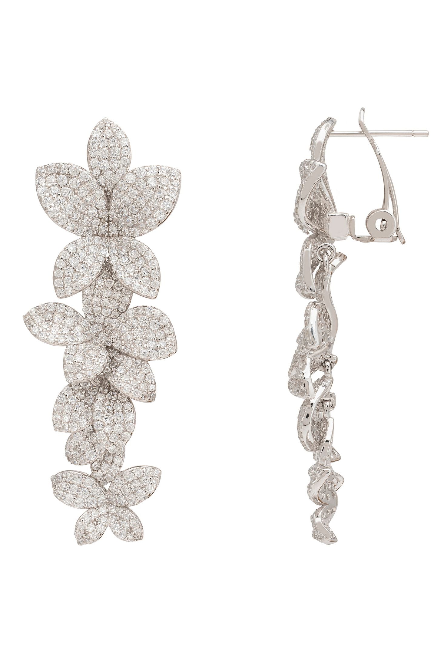 Silver flower-shaped earrings on a white background