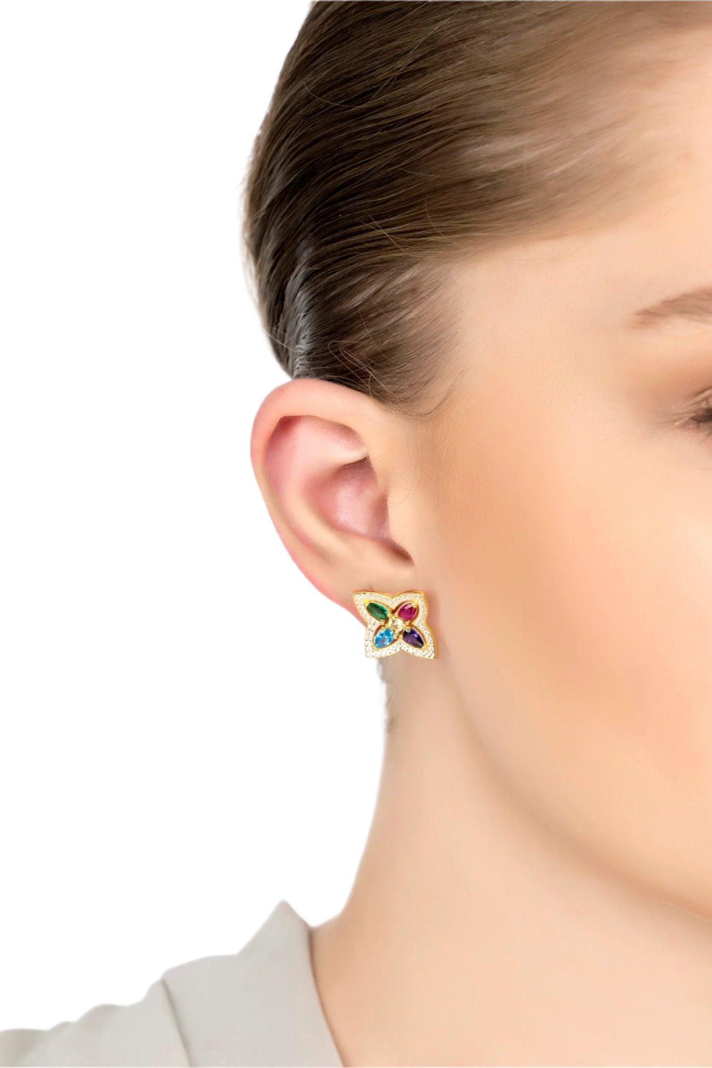 The earring worn by a model.