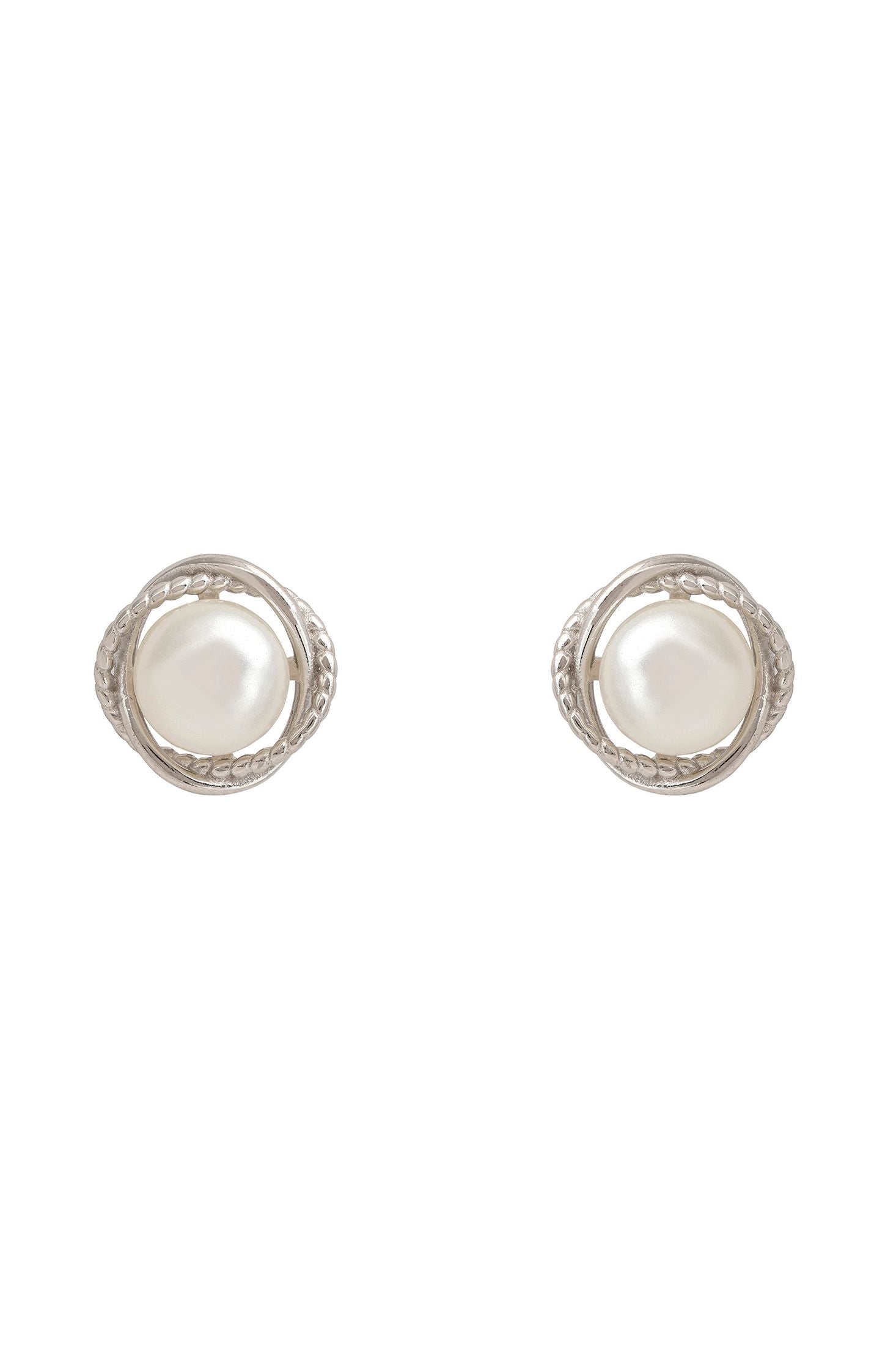 Pair of silver earrings with pearl centers on a white background