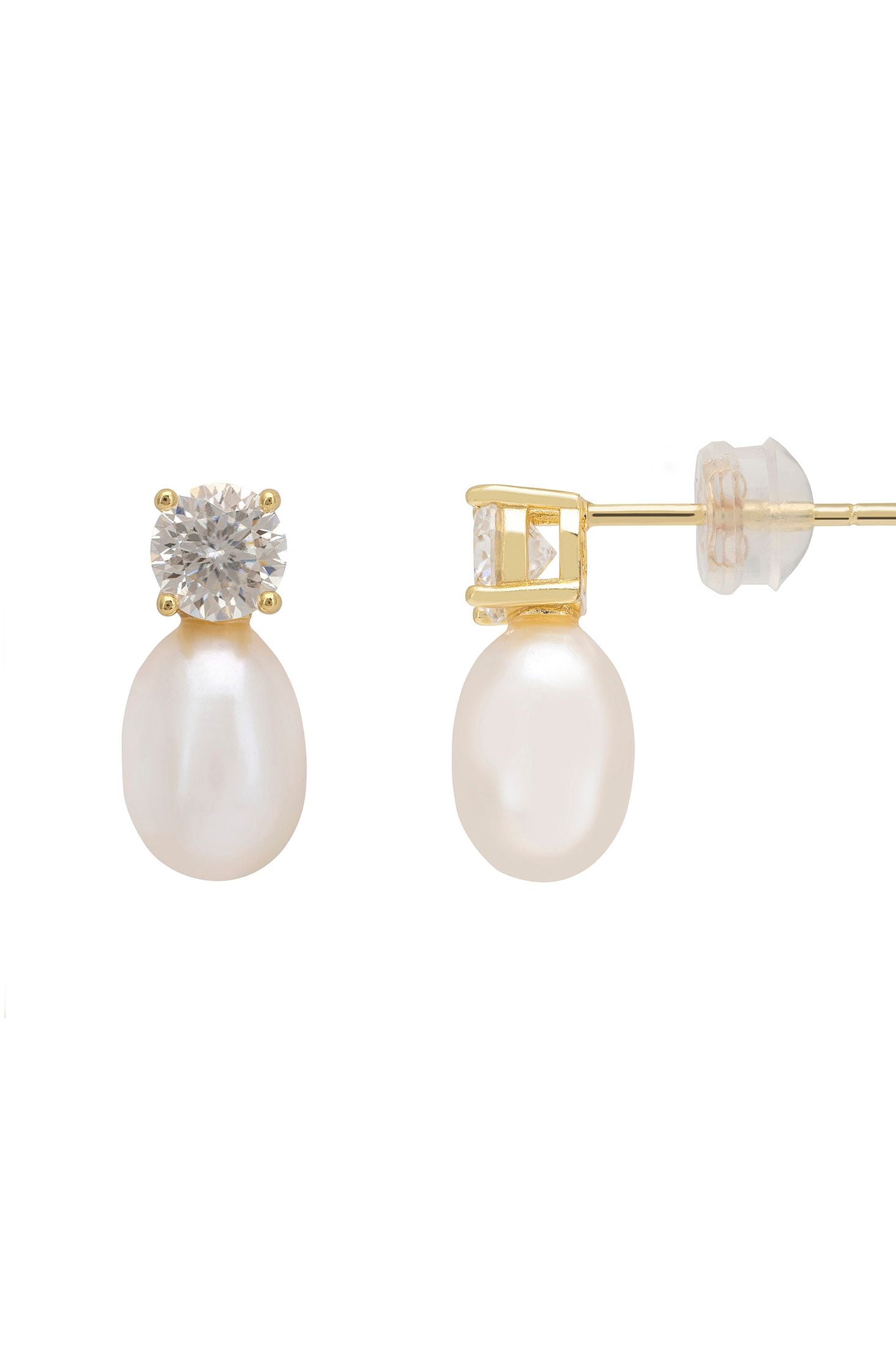 Pair of pearl earrings with gold and diamond accents on a white background