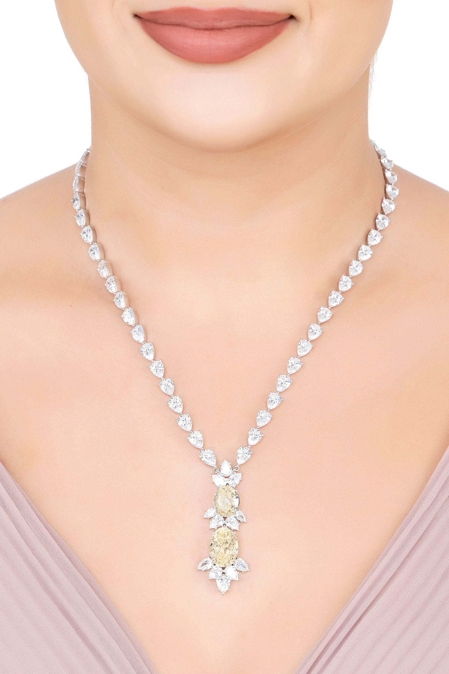 The necklace worn by a model.