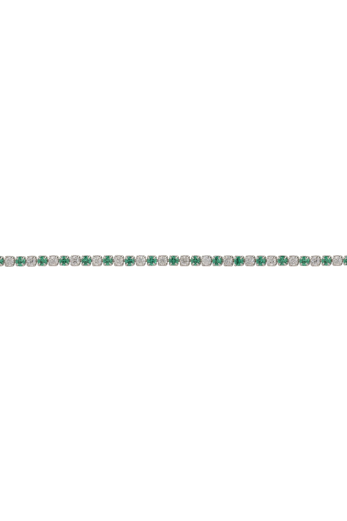 Green gemstone bracelet on a white background