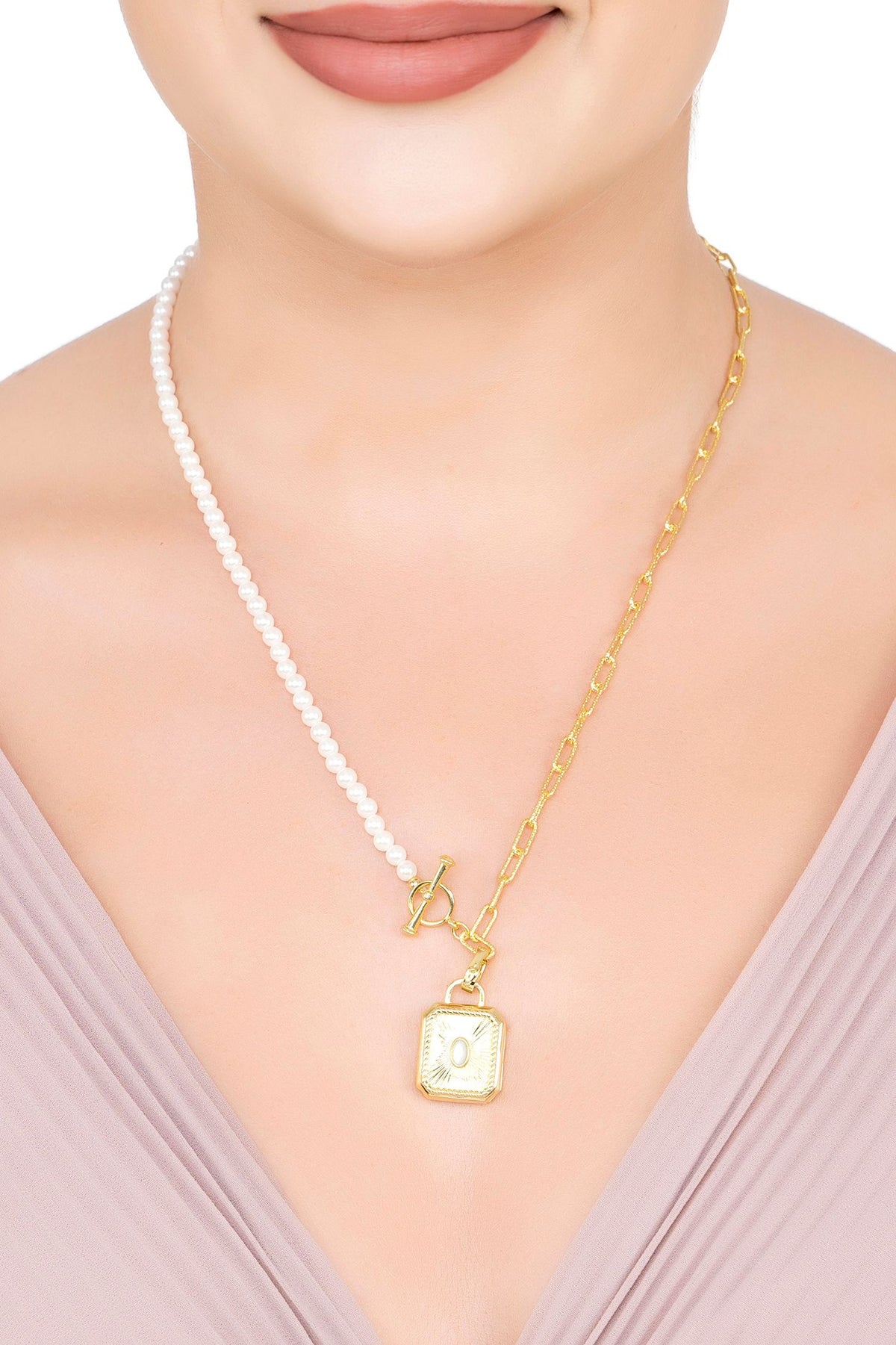 The necklace worn by a model.