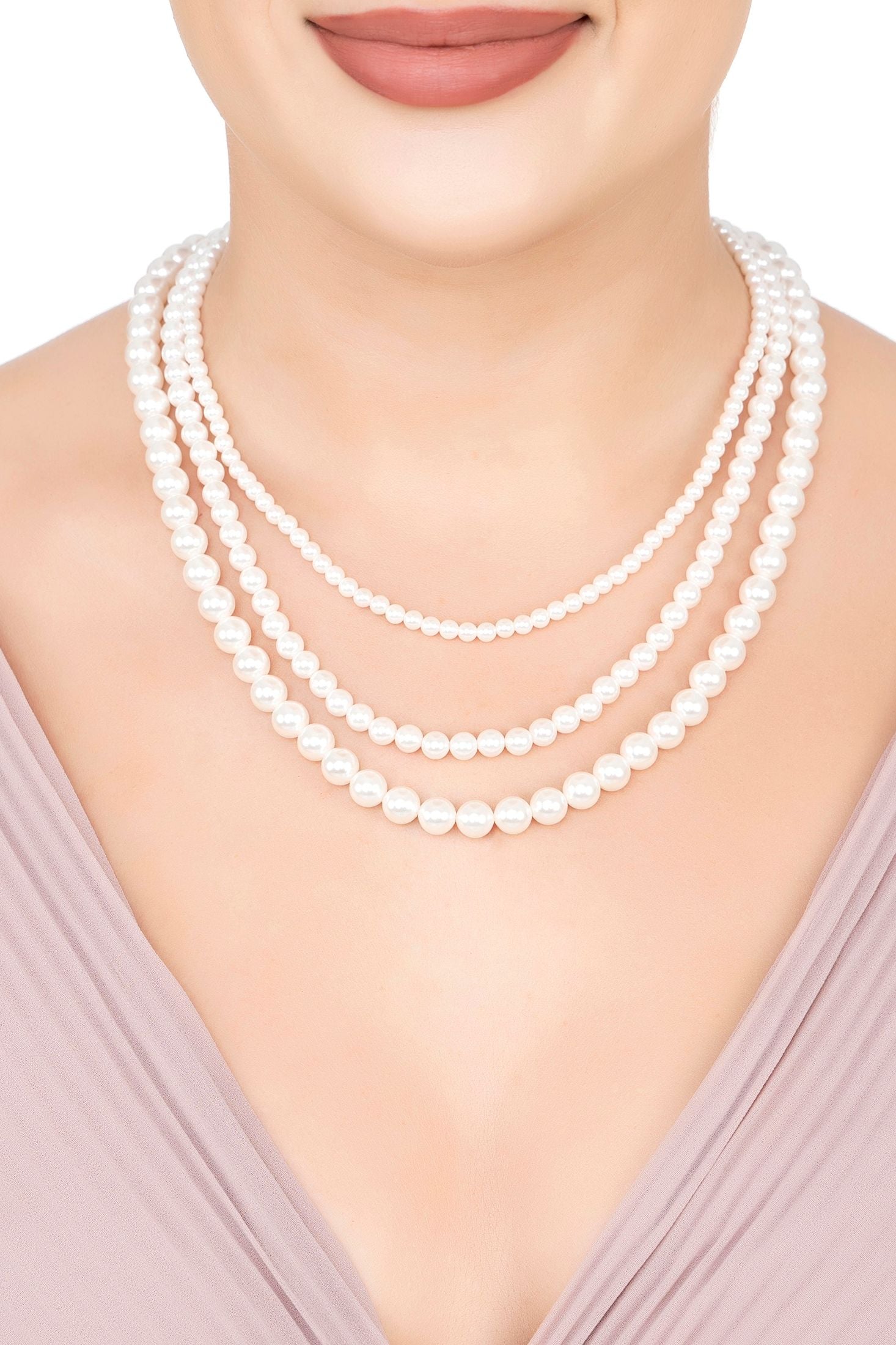 The necklace worn by a model.