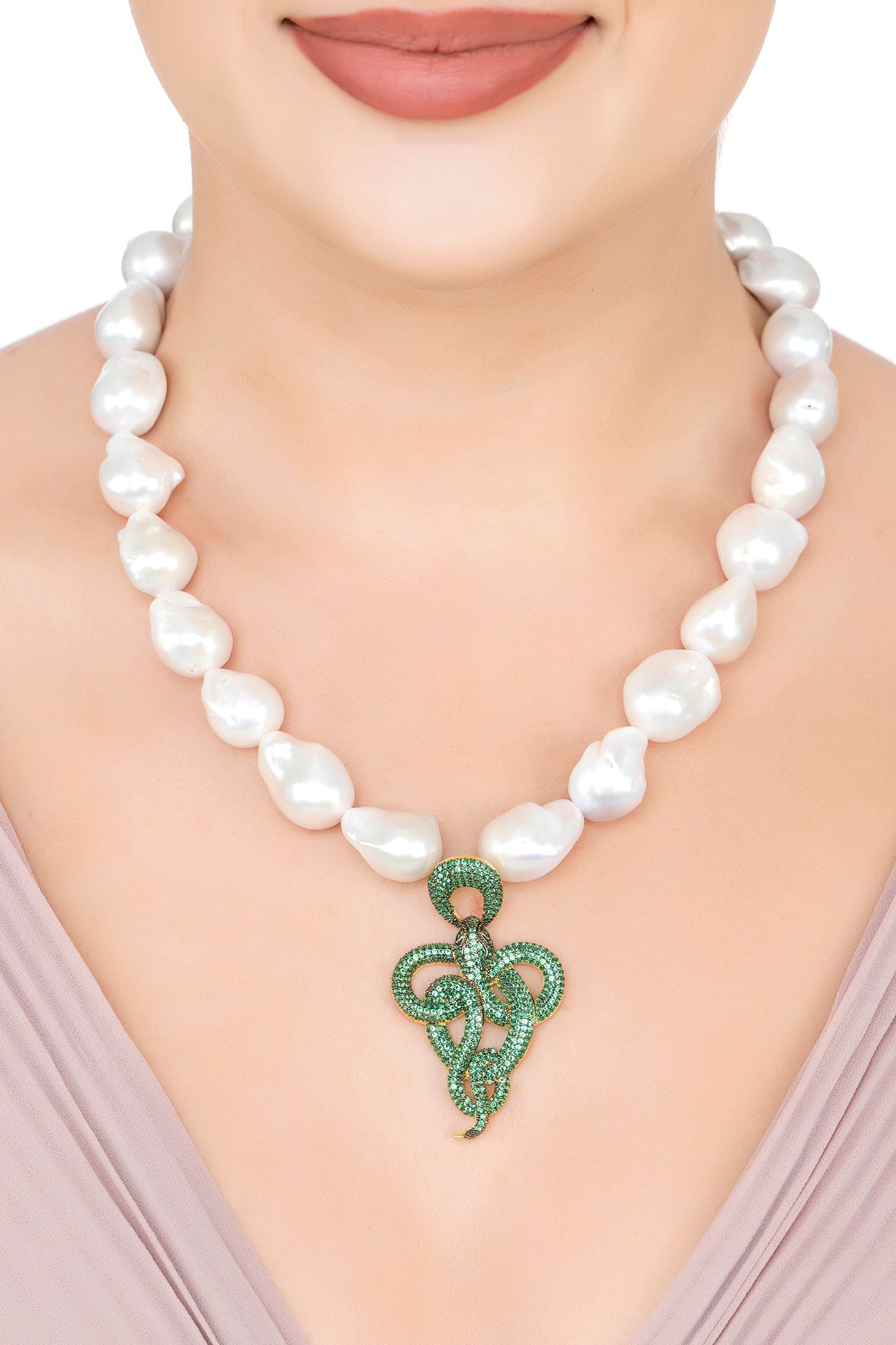 The necklace worn by a model.