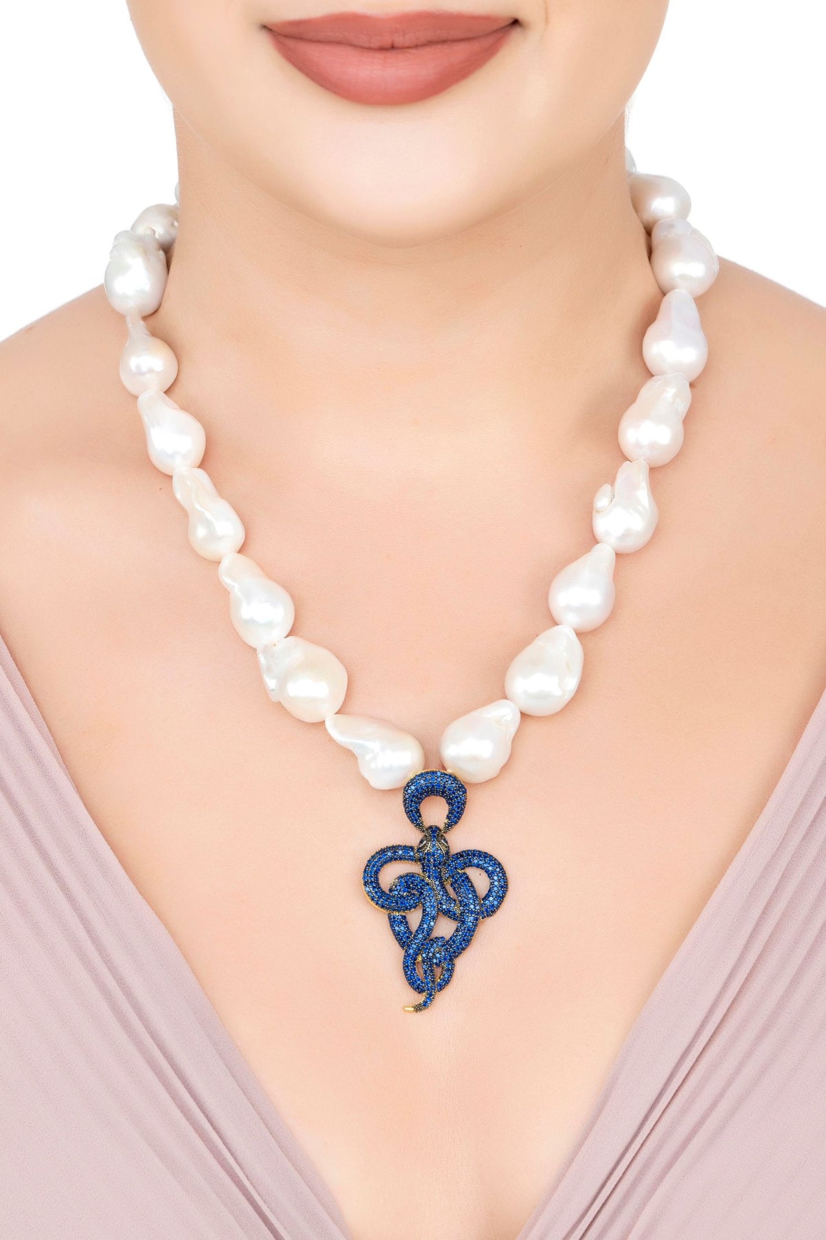 The necklace worn by a model.
