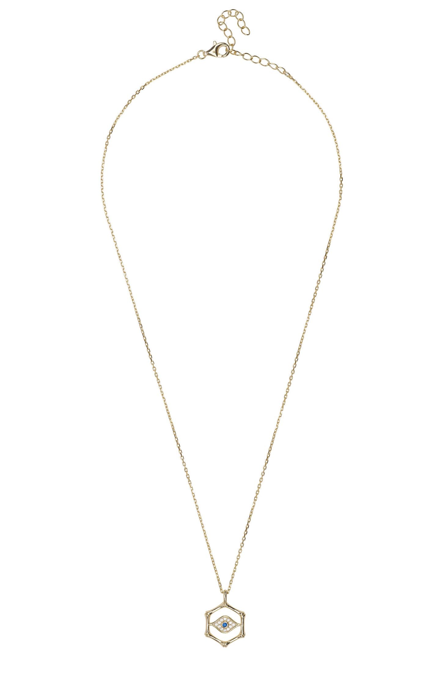 Gold necklace with a hexagonal pendant on a white background