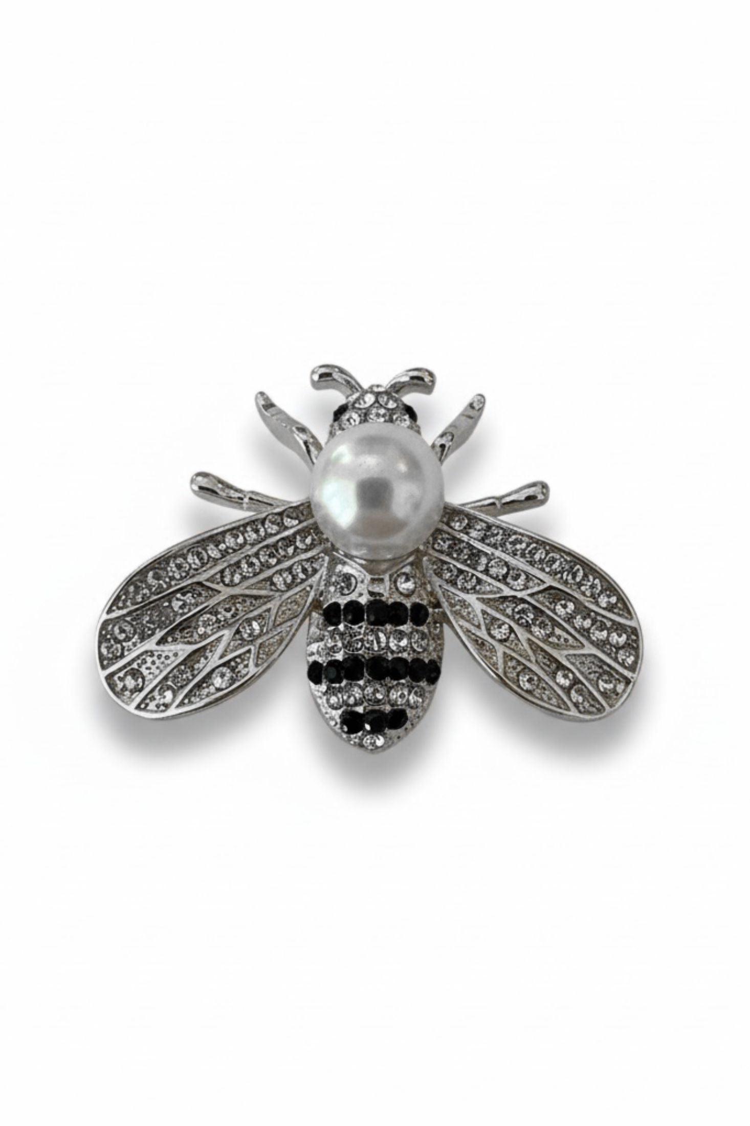 Bee brooch with pearl and gemstone details on a white background