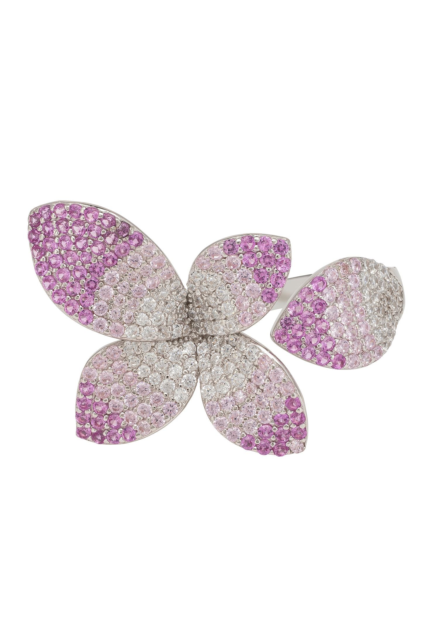 Butterfly-shaped ring with purple and silver glitter on a white background