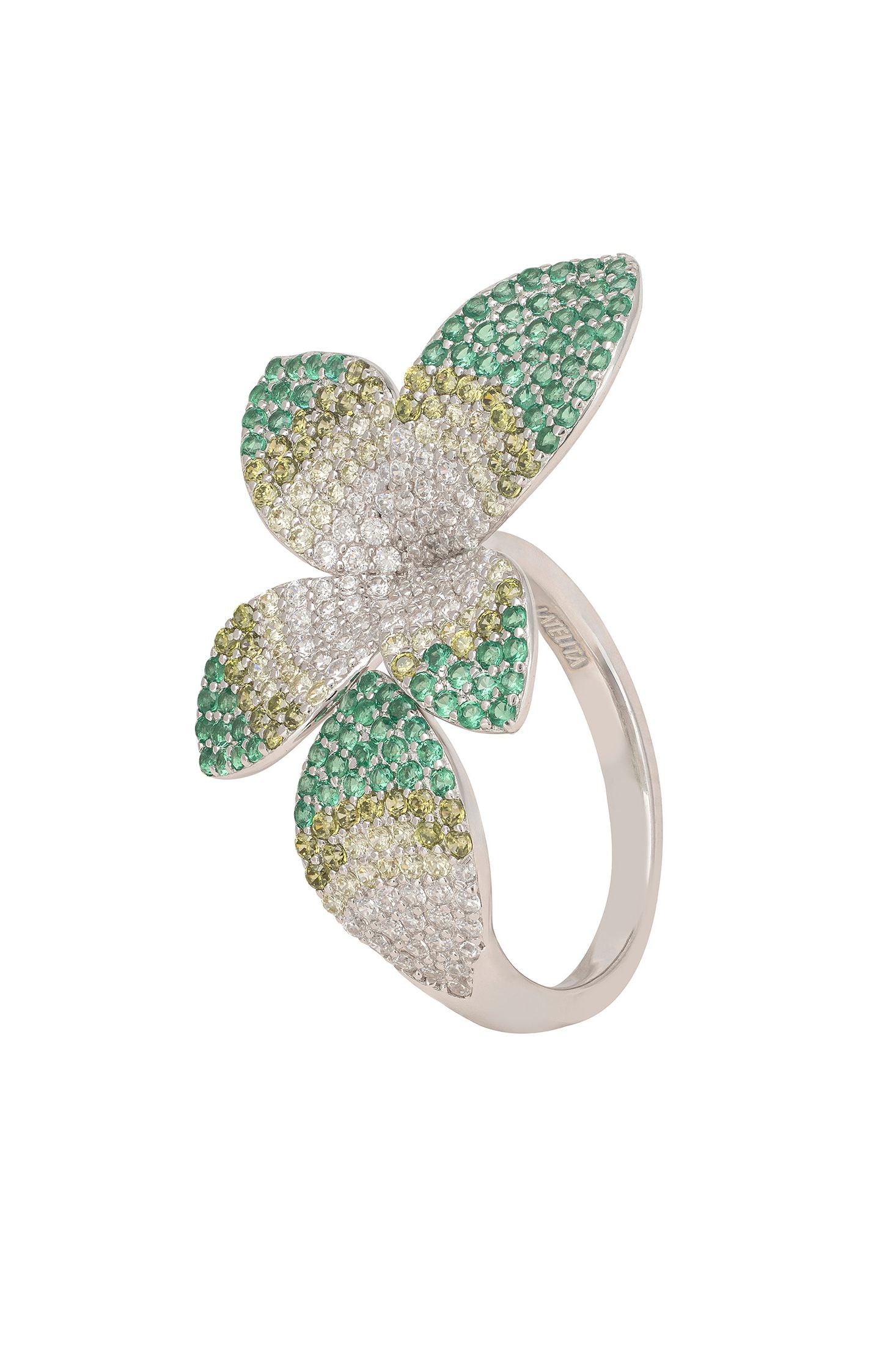 Flower-shaped ring with green and gold gemstones on a white background
