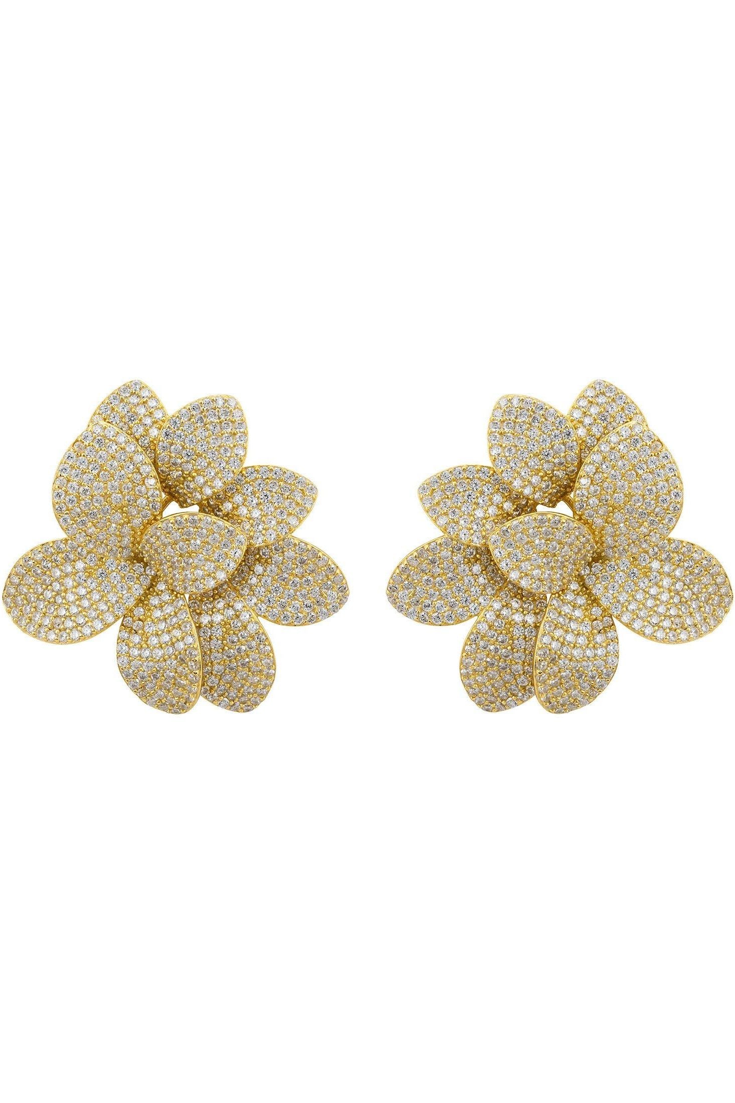 Gold flower earrings.