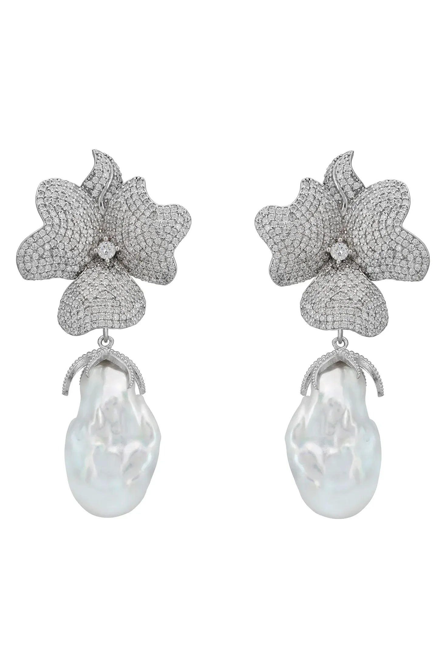 Large pearl and diamond flower earrings.