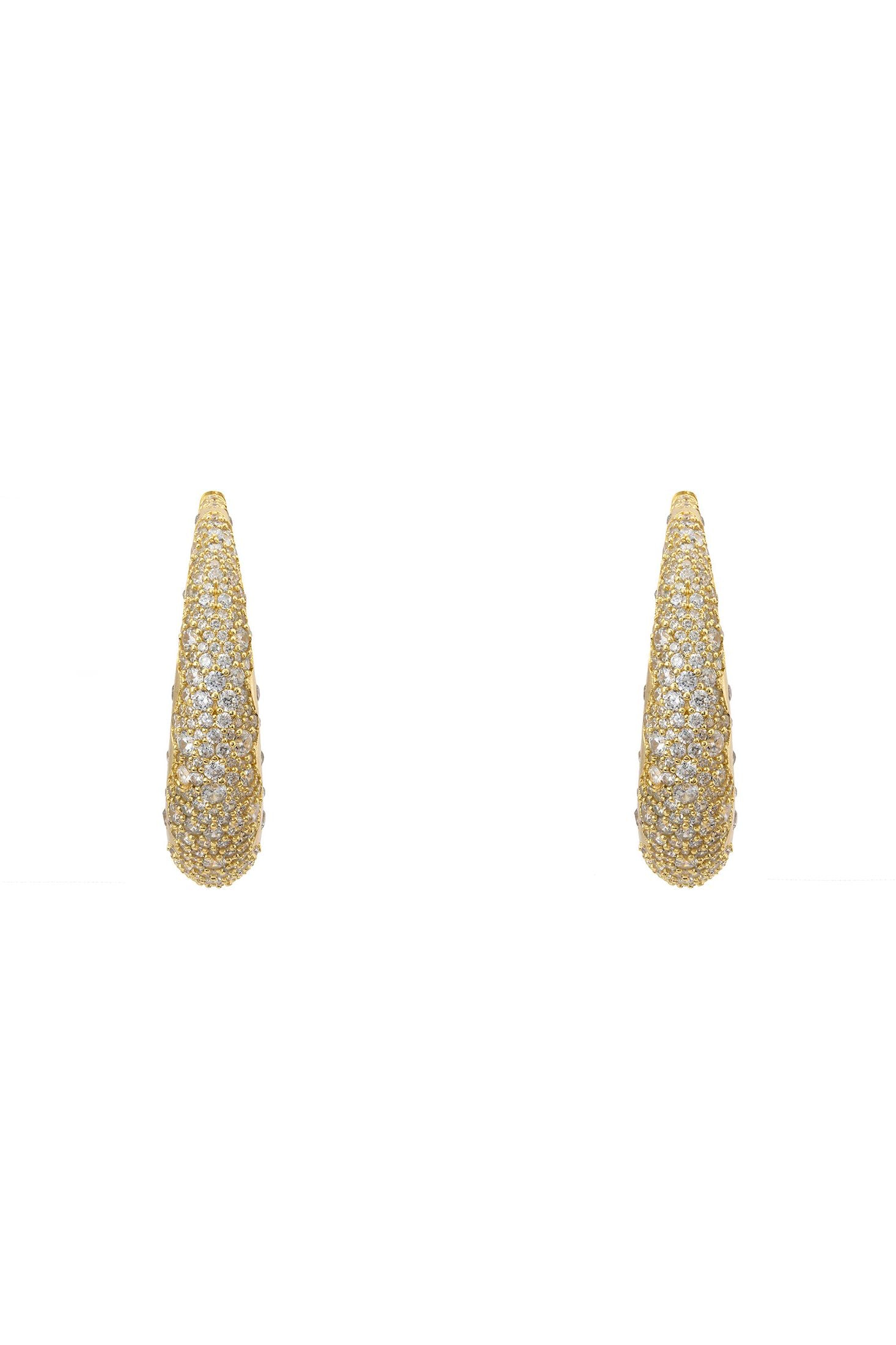 Diamond moon dust crescent gold hoop earrings.