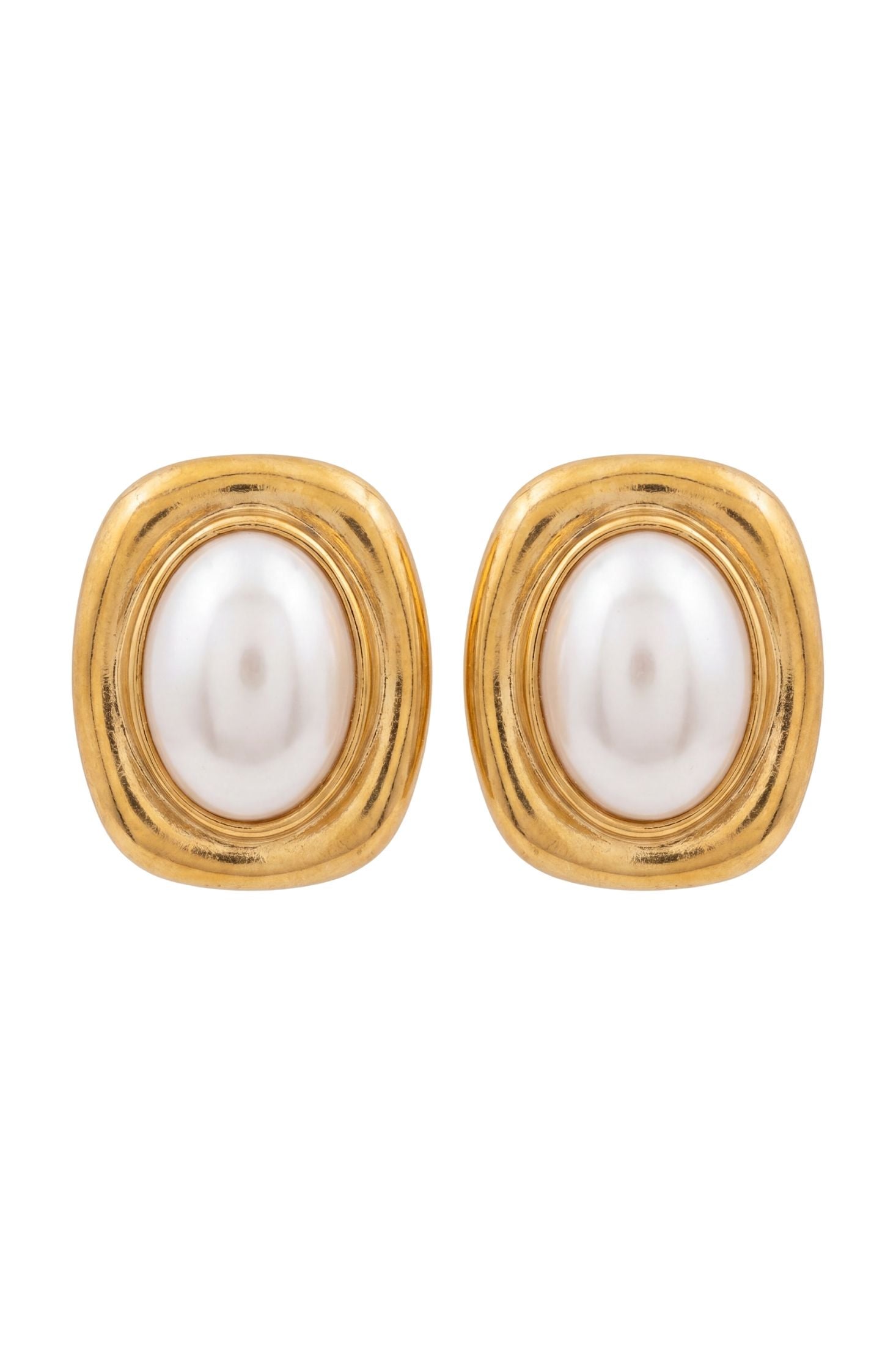 A pair of gold-toned stud earrings with oval white faux-pearl centers, set against a plain white background.