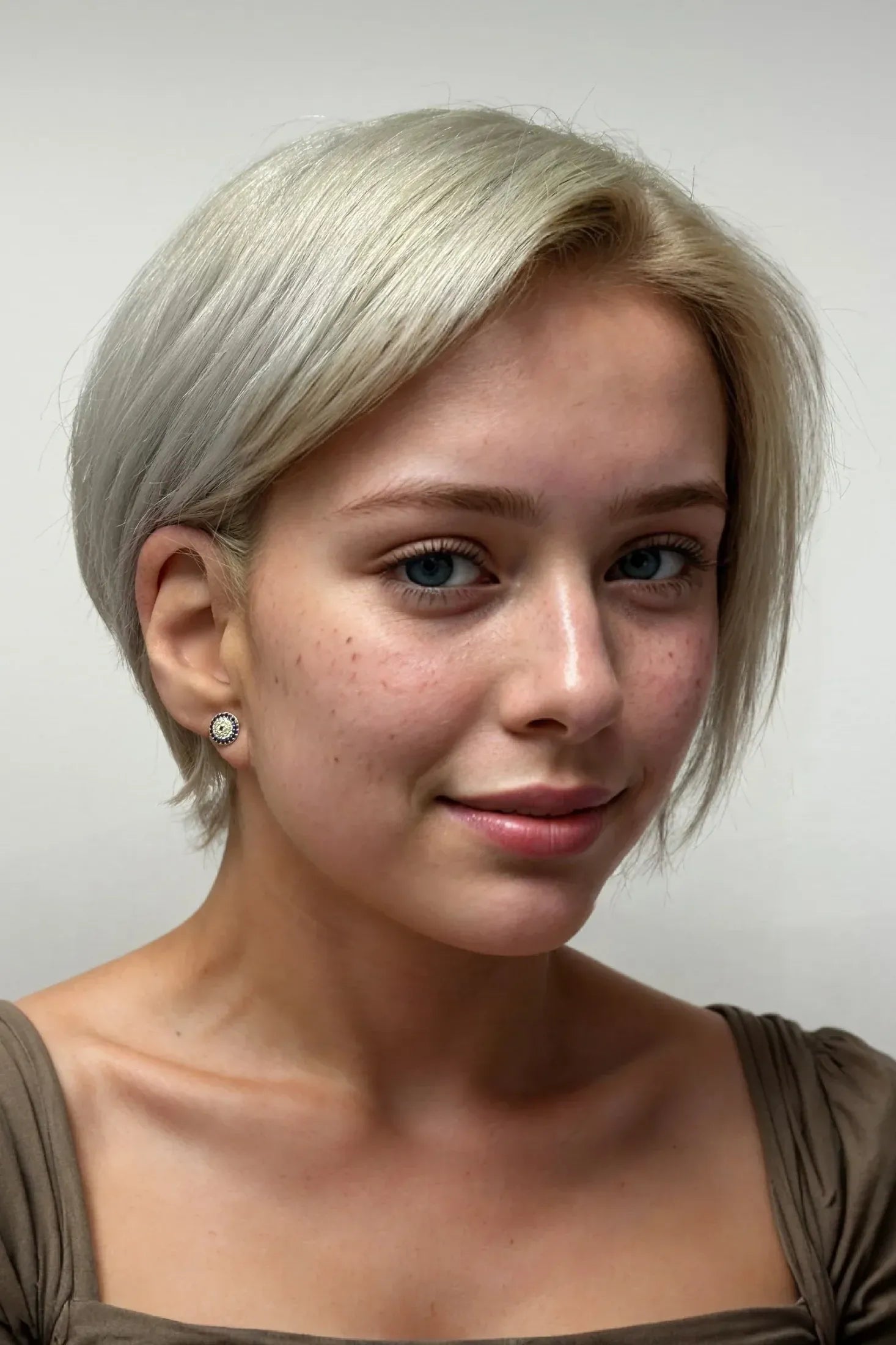 The earring worn by a model.