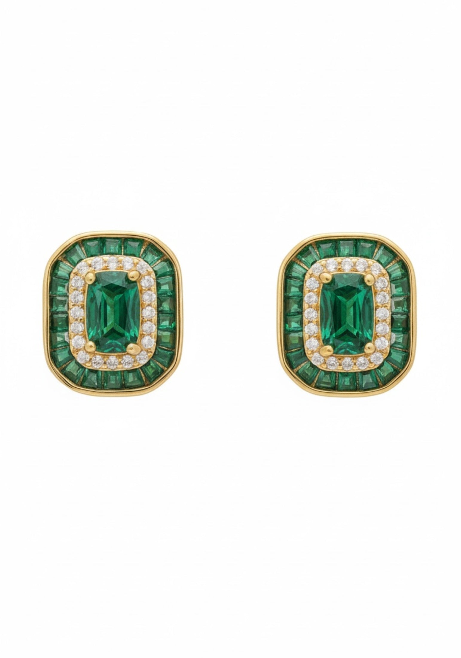 Diamond and emerald gold stud earrings.