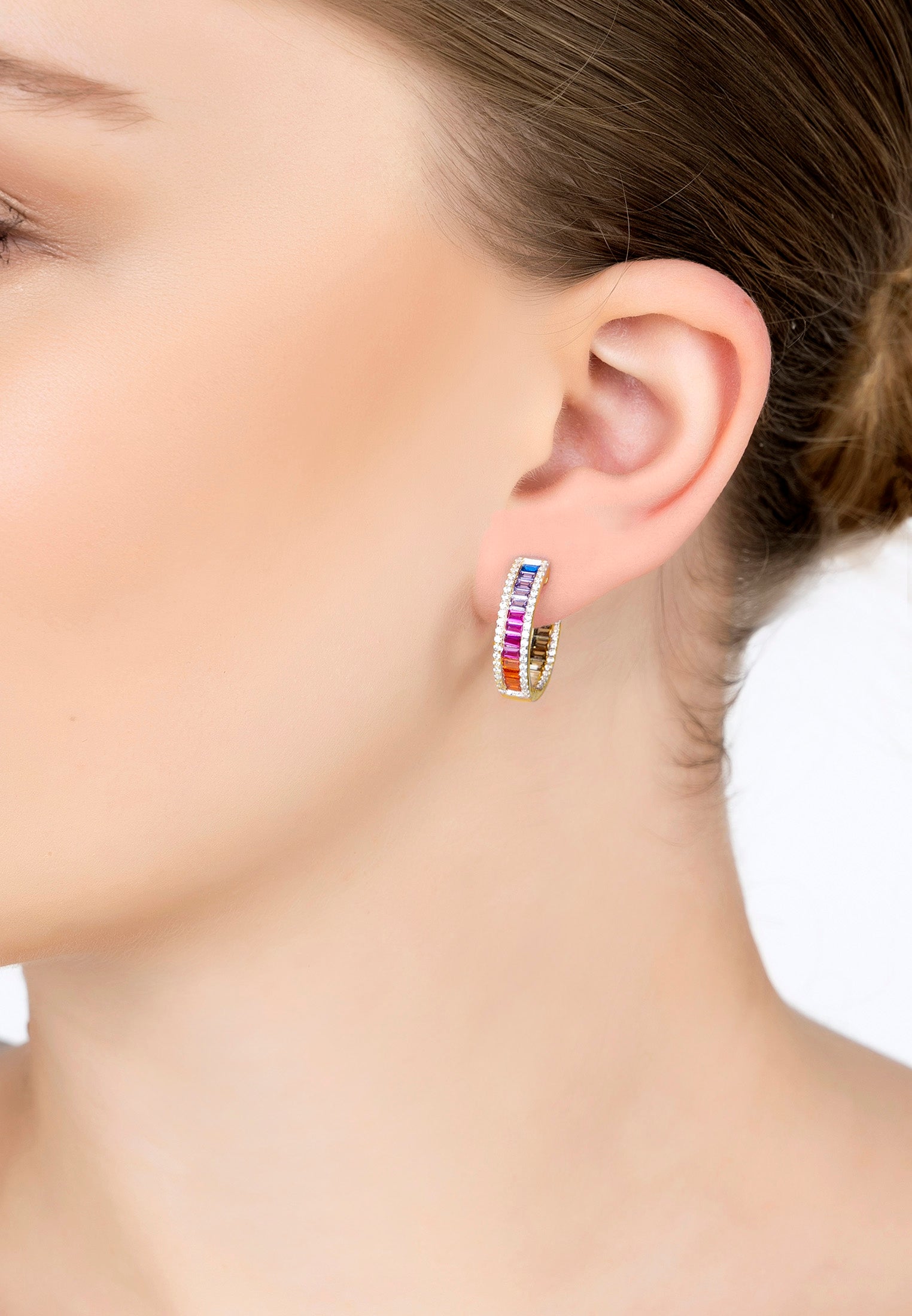 The earring worn by a model.