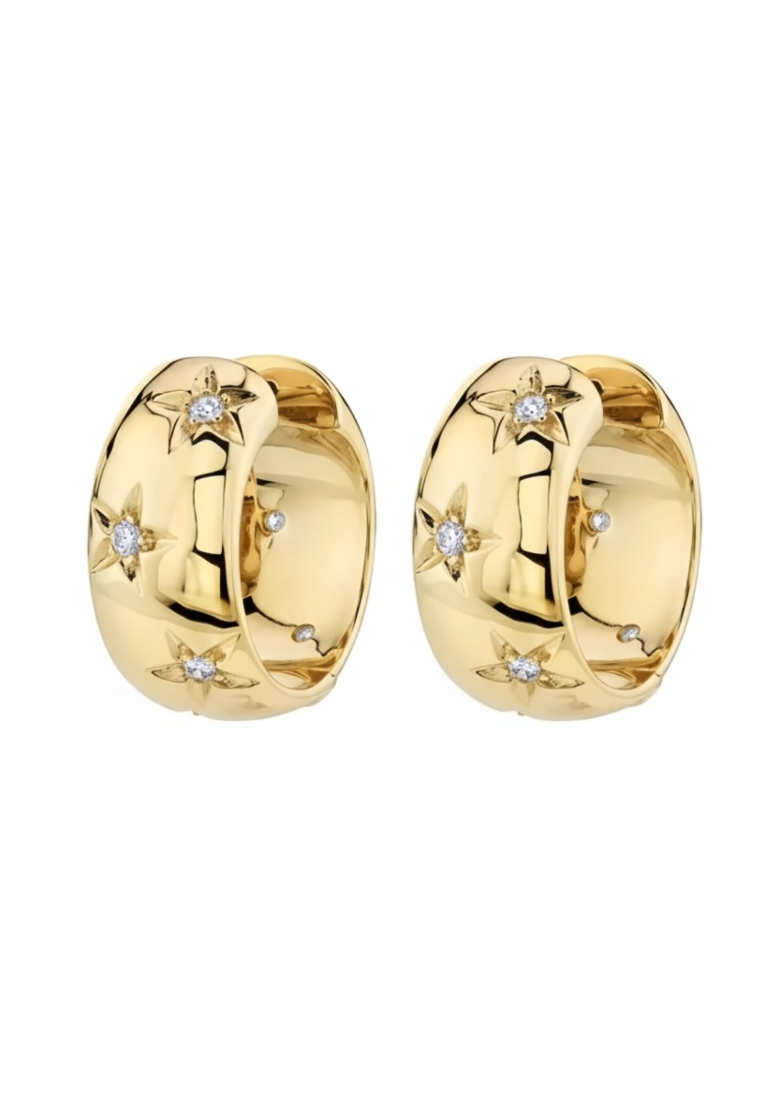 Gold hoop earrings with embedded diamonds on a white background