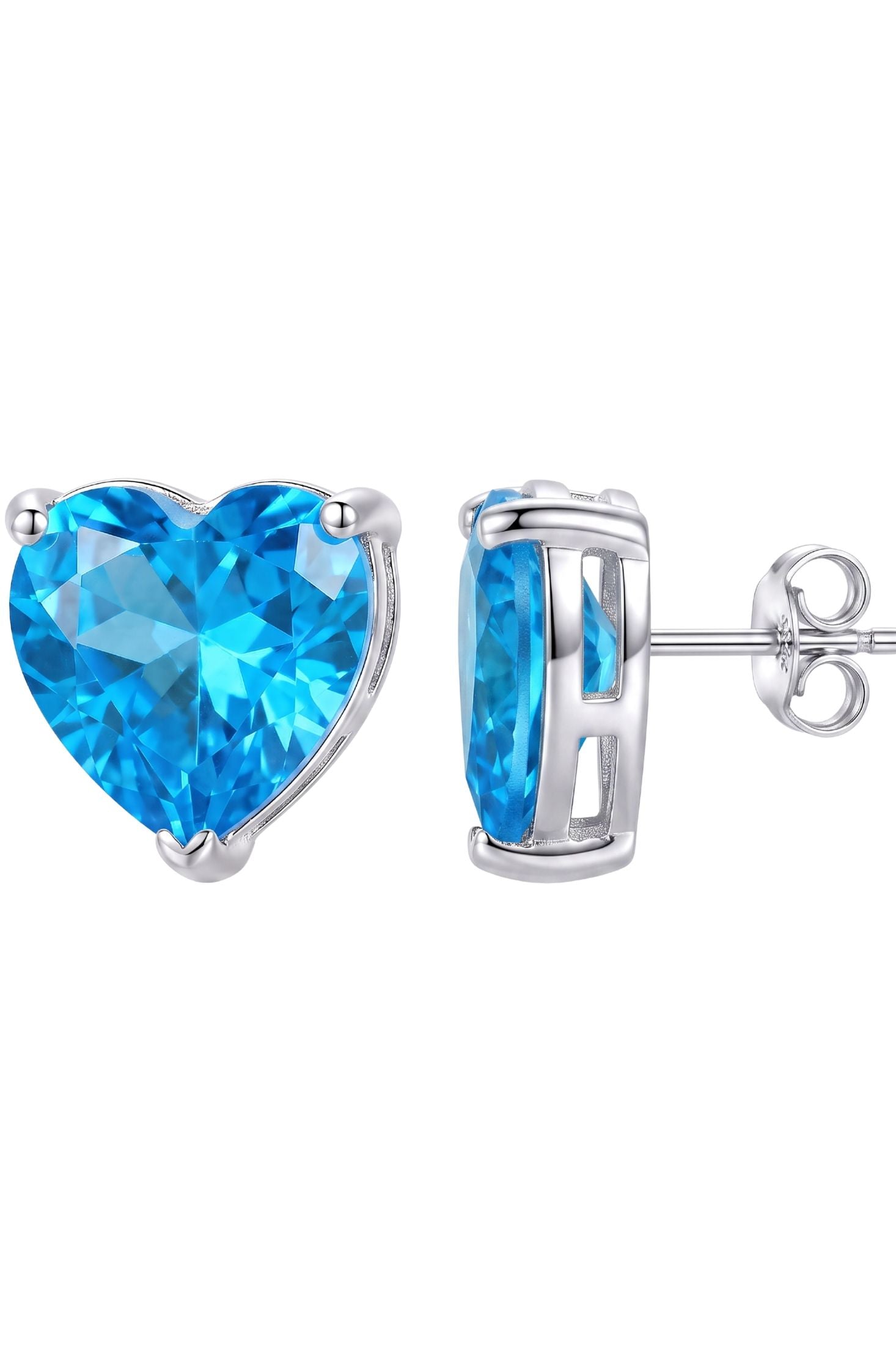 Angled view of Amore Heart Blue Topaz Stud Earrings Silver, showing heart design, blue topaz detailing, silver finish and the jewellery profile.