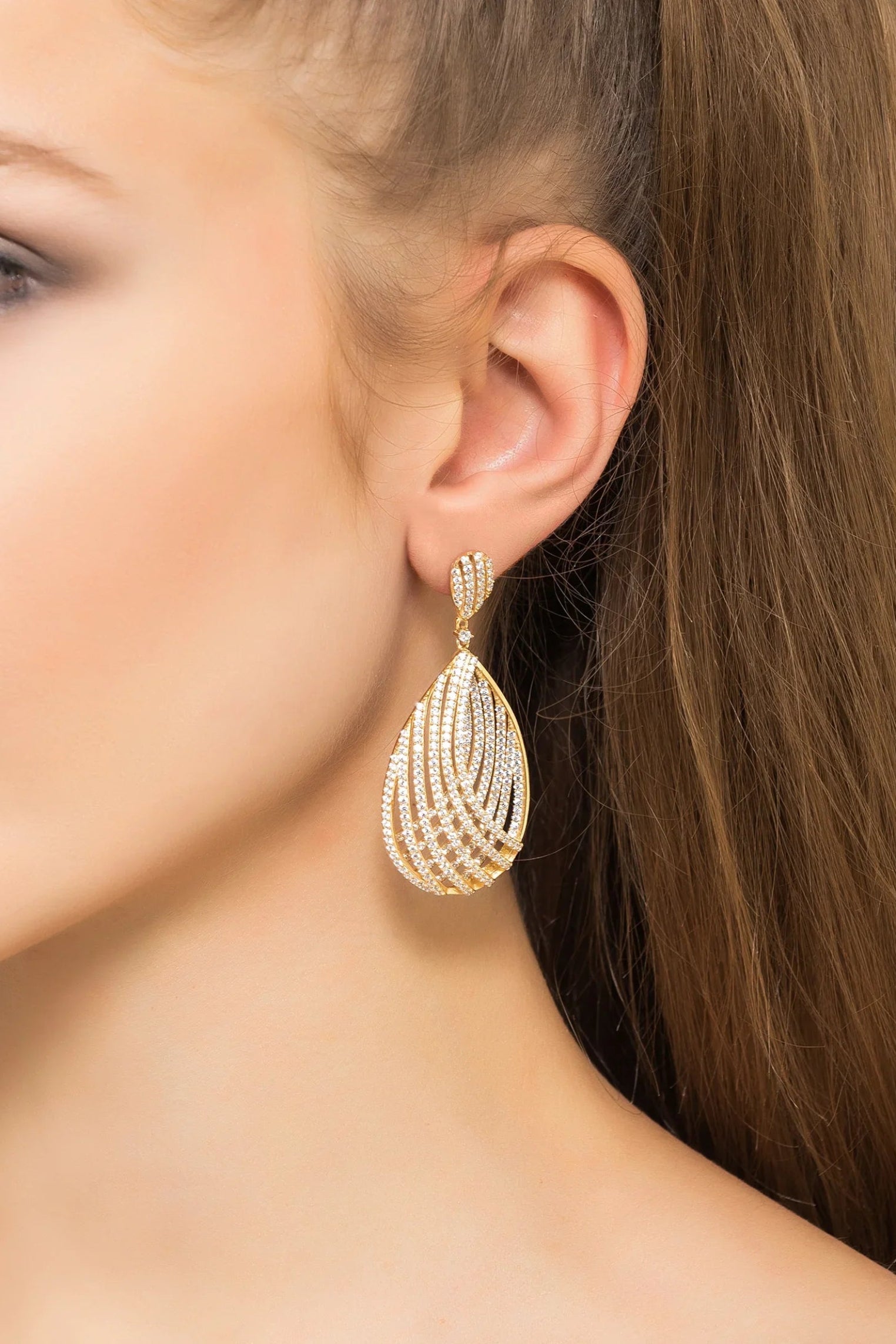 The earring worn by a model.