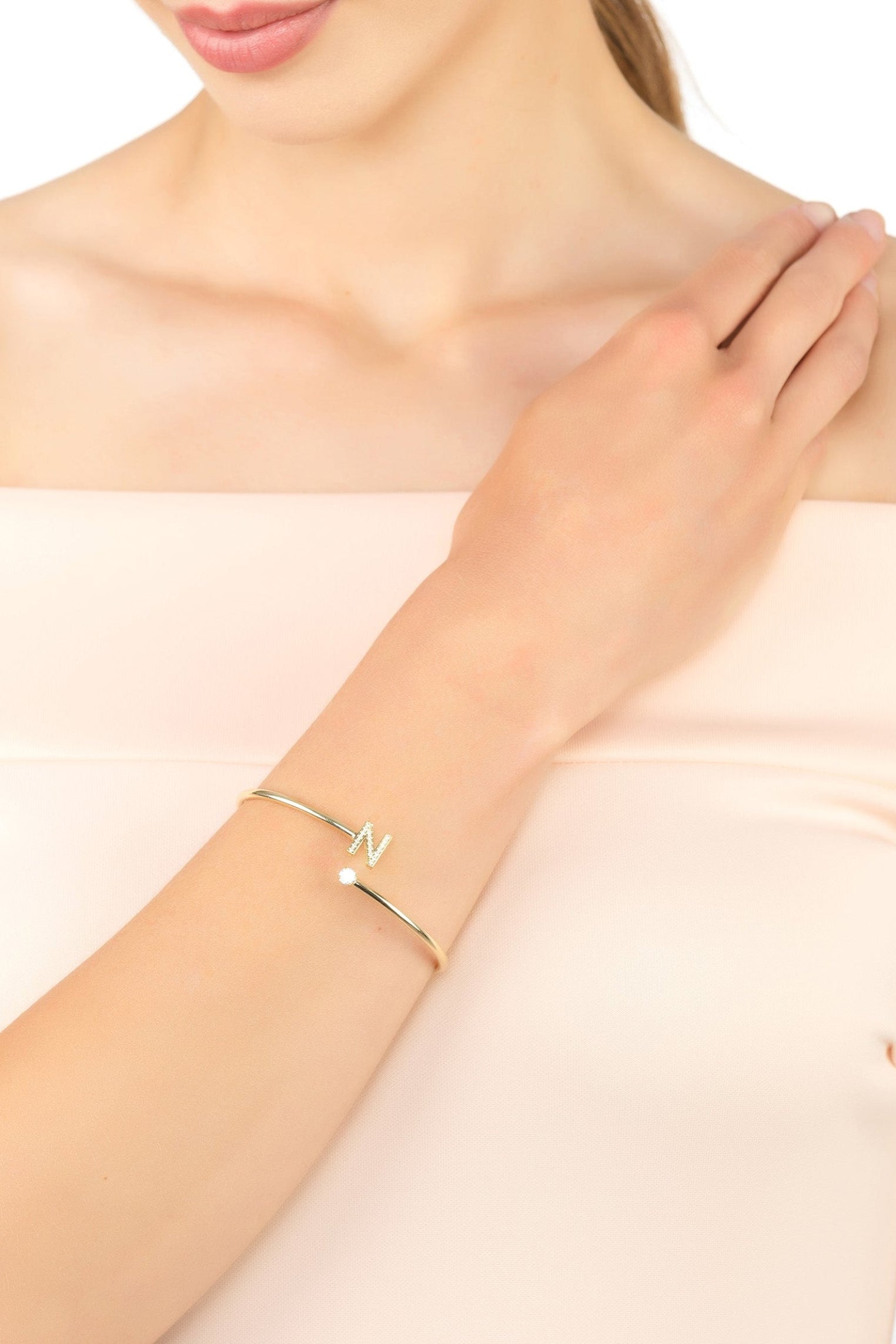 The bracelet worn by a model.
