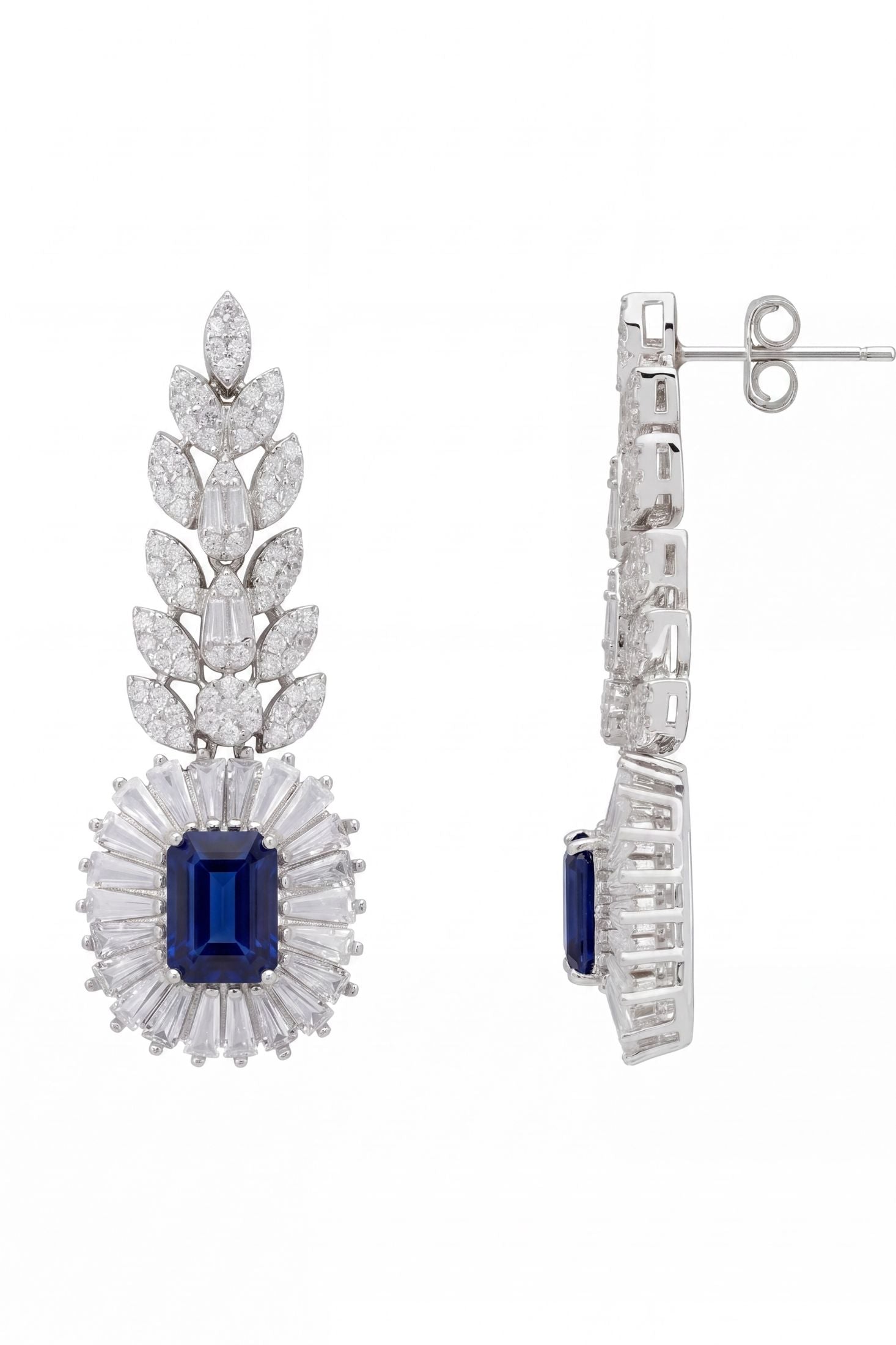 Angled view of Countess Gemstone Drop Earrings Sapphire Silver, showing sapphire detailing, silver finish and the jewellery profile.