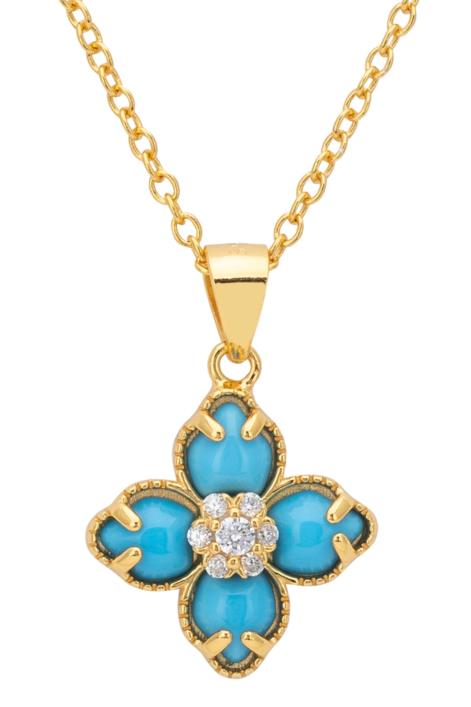 Close-up of the gold and turquoise clover pendant.