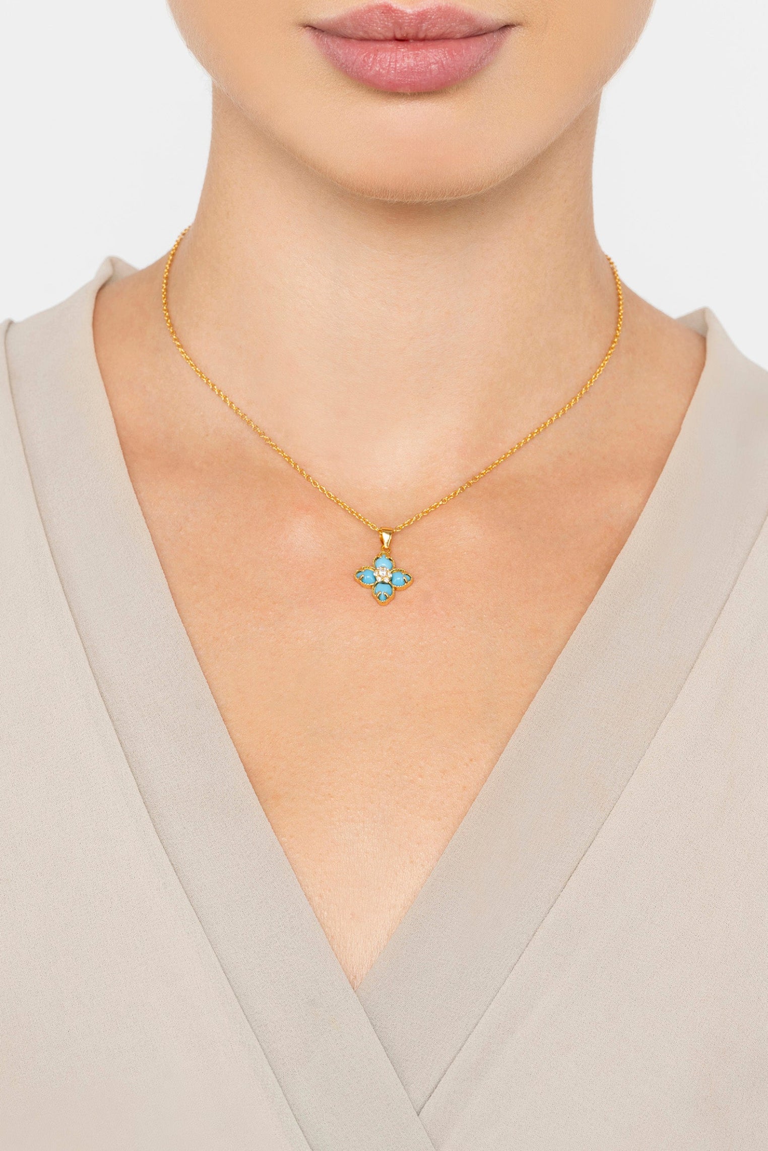 The necklace worn by a model.